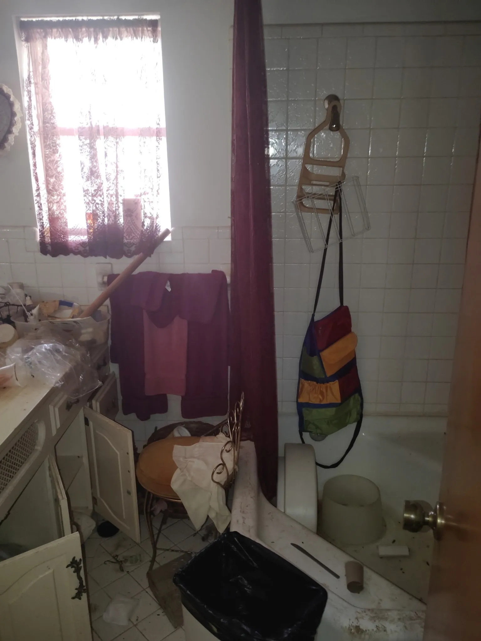 Full bathroom featuring vanity and tile walls