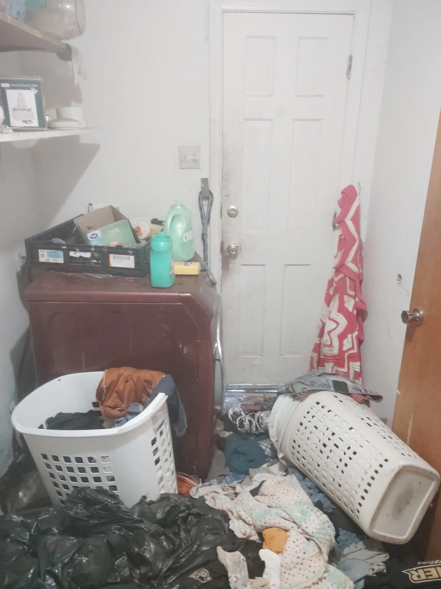 Laundry room featuring washer / clothes dryer