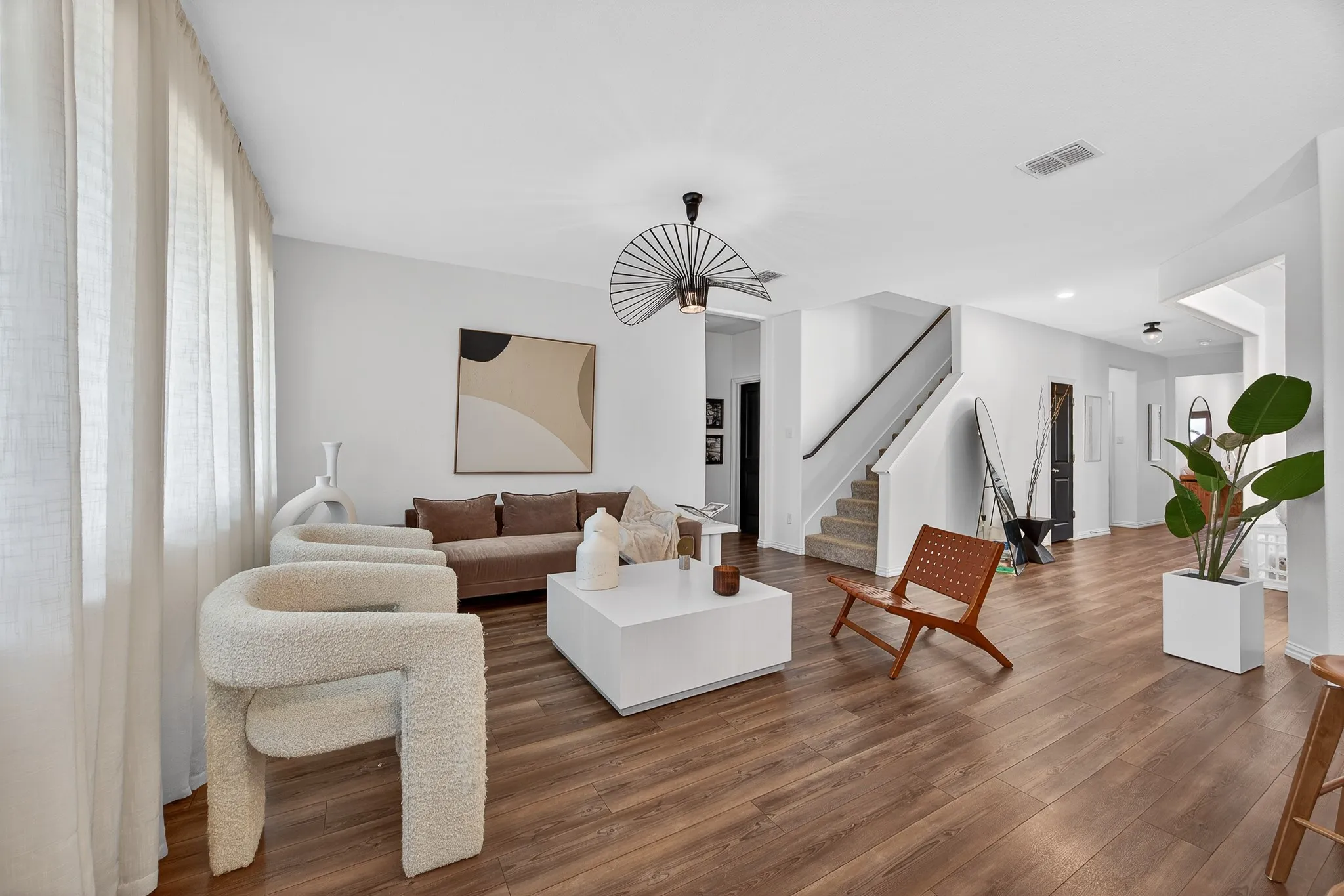 Living room featuring wood finished floors