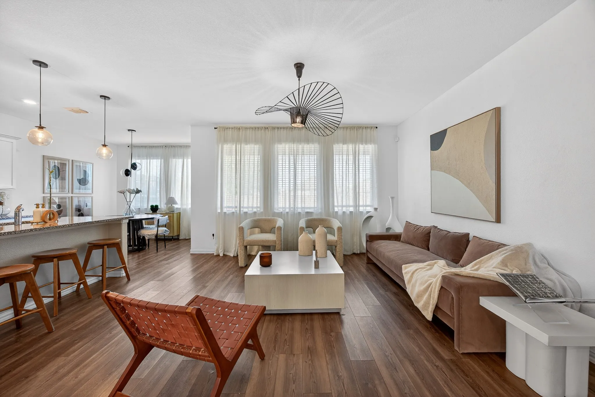 Living room featuring dark wood-style flooring