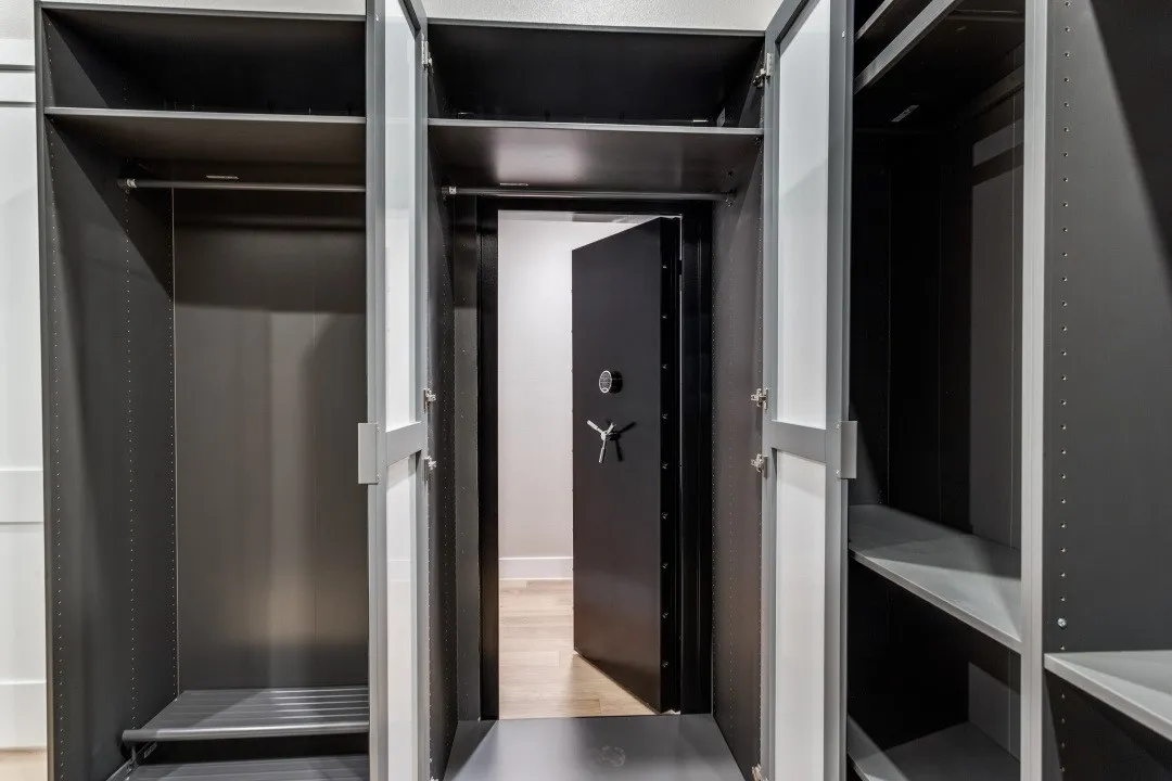Safe room/storm shelter behind mirrors in primary closet