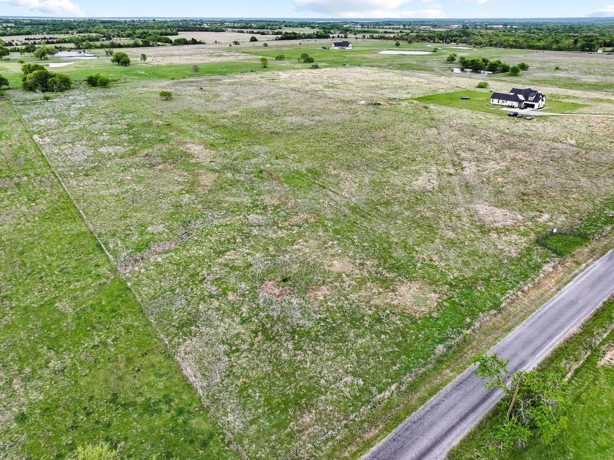 Expansive undeveloped land parcel with road frontage