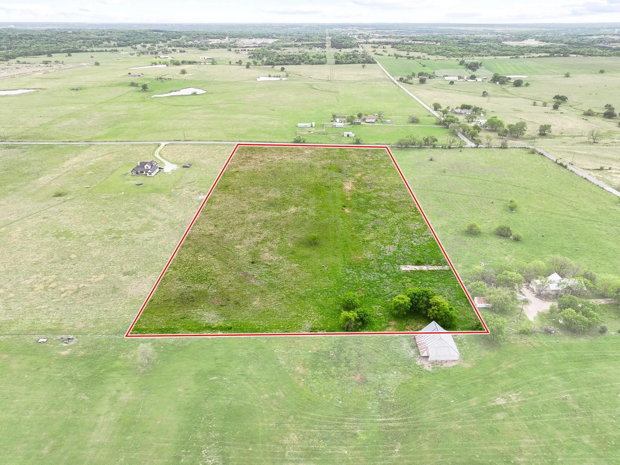 Expansive parcel featuring open fields and scattered trees