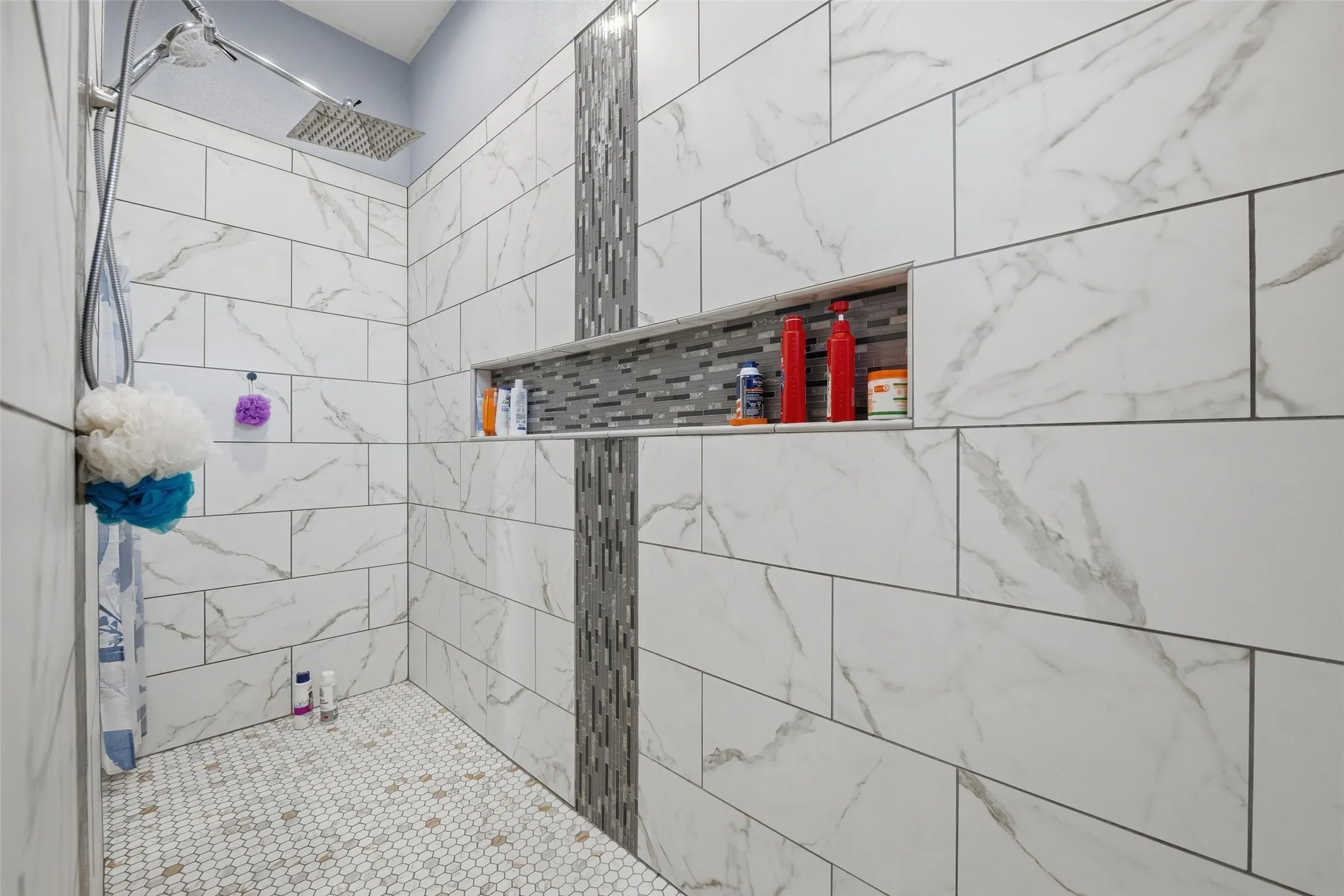 Bathroom with a tile shower