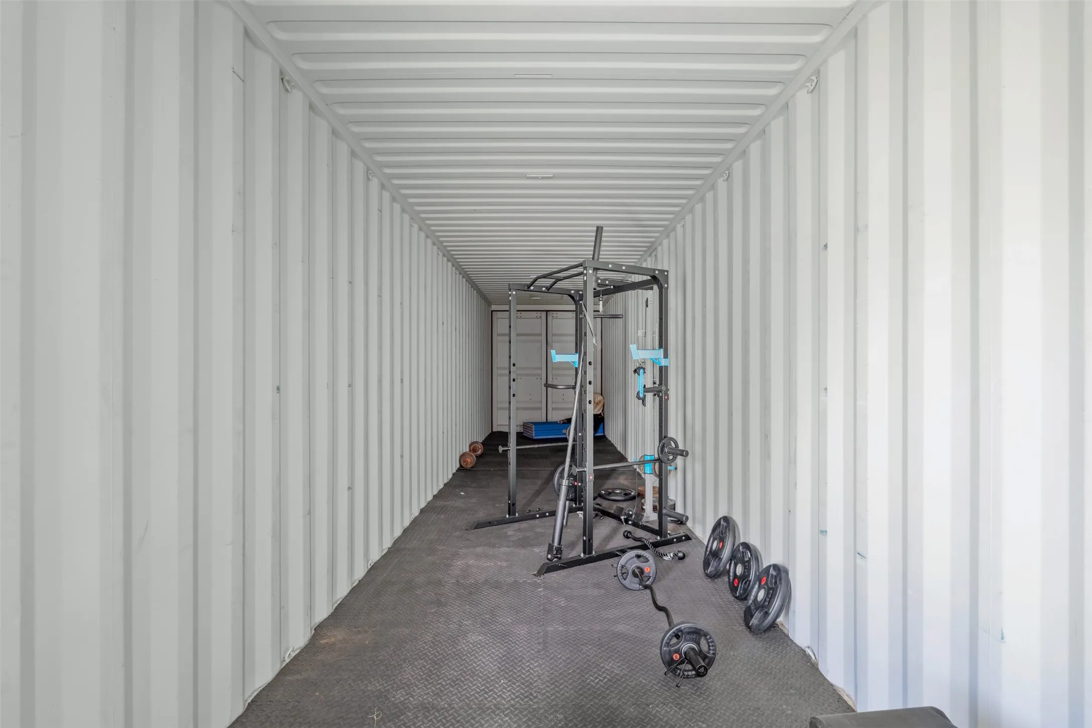 Shipping container converted into exercise room on Whitney TX acreage