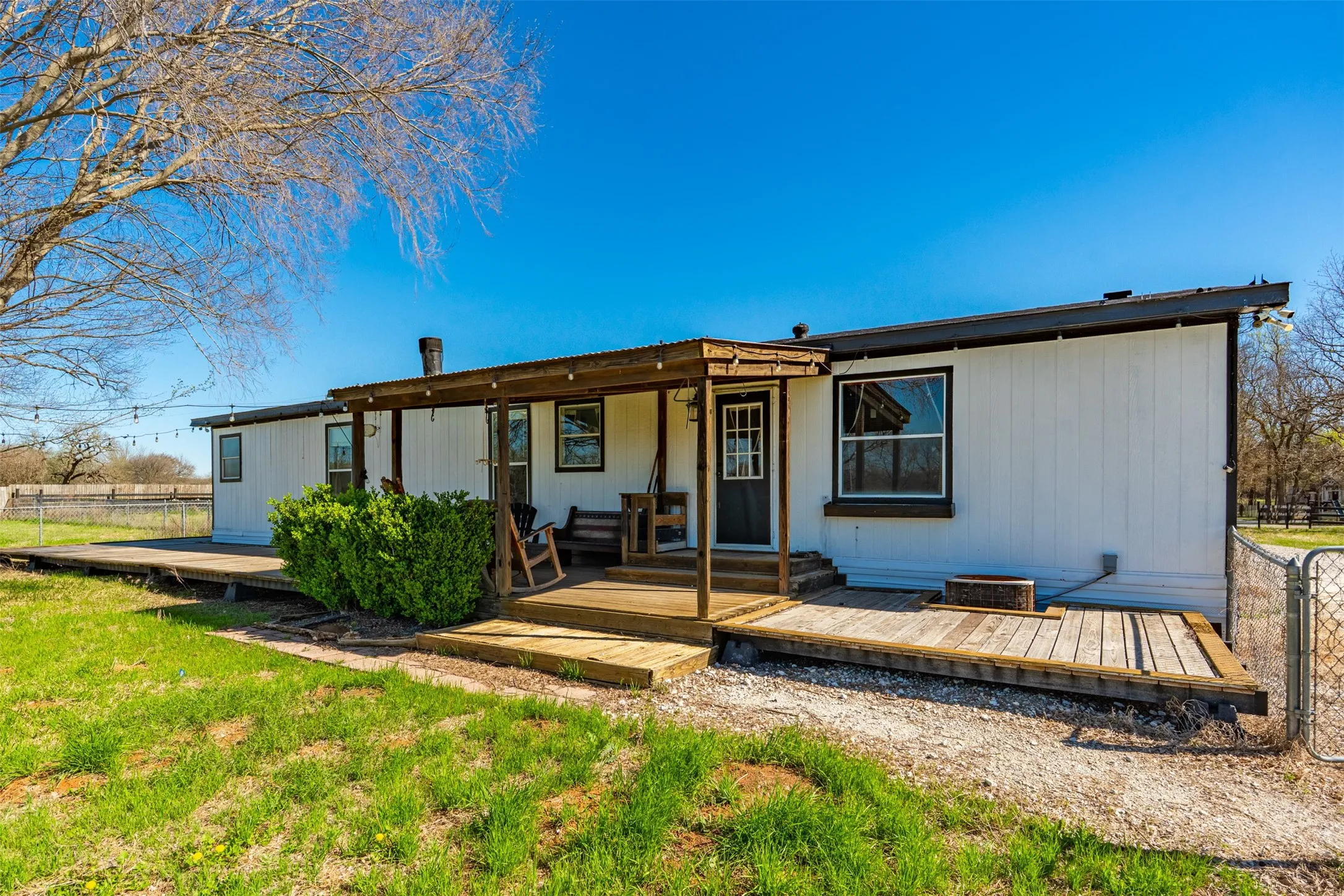 Backyard view of Whitney TX home with scenic countryside surroundings