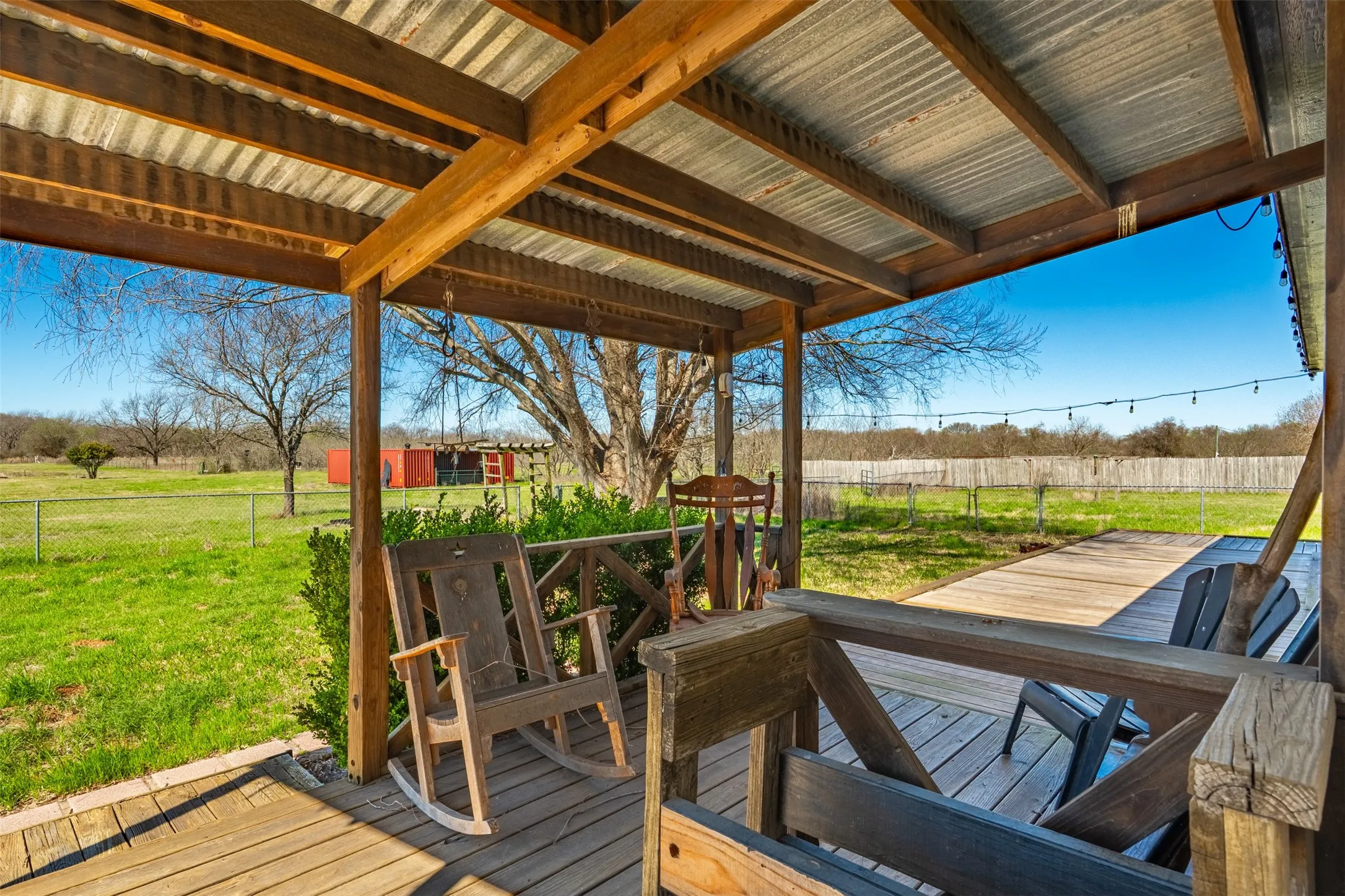 Backyard view of Whitney TX home with scenic countryside surroundings