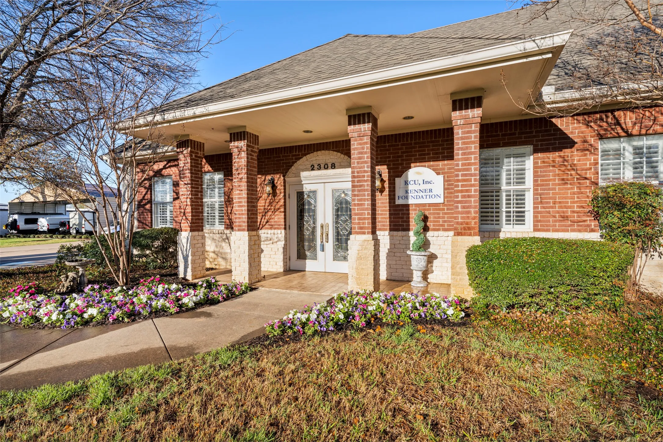 Another front view showing landscaping