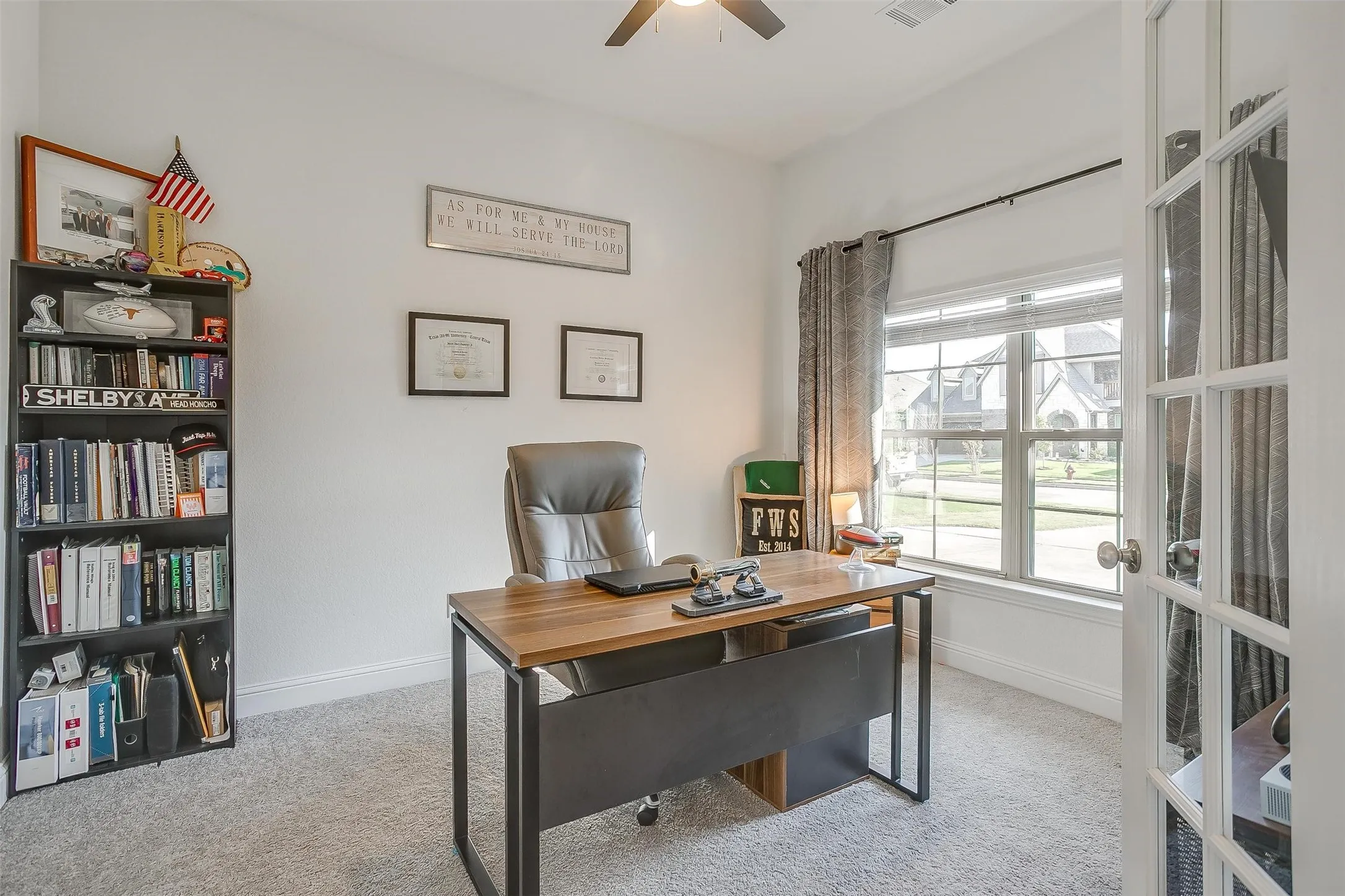 The perfect office space, just off the entry, is separate from the rest of the house so you can work with privacy and quiet.  Spacious, with lots of natural light from front windows and enclosed by French doors.