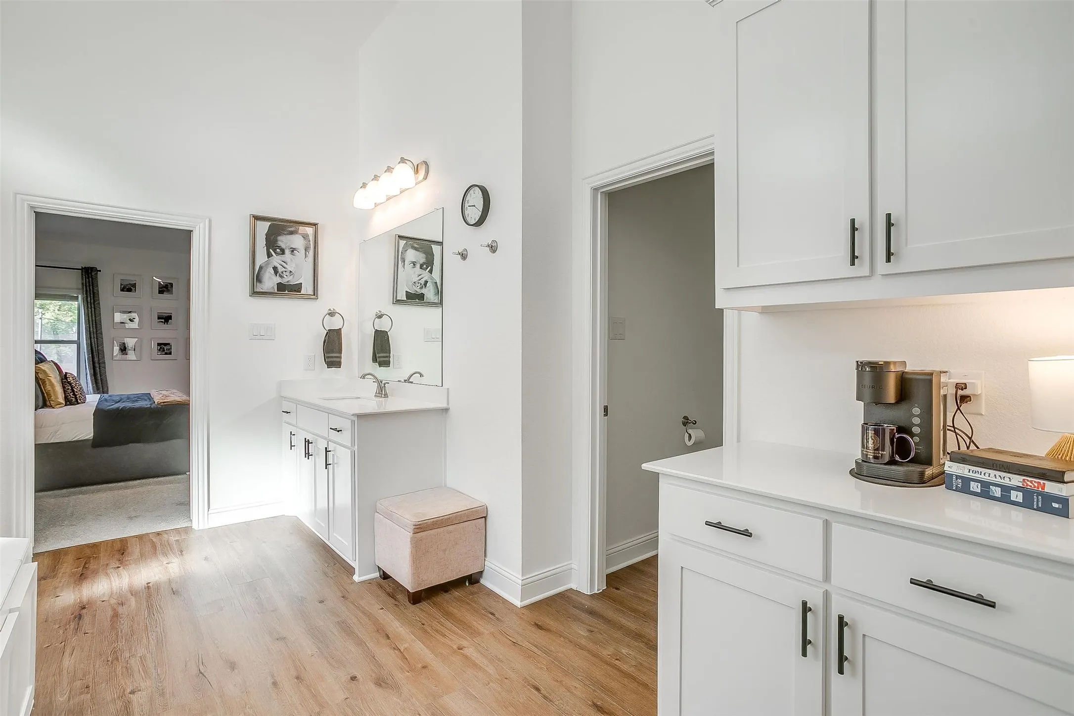 Primary bath with easy care luxury vinyl flooring, dual sinks, Hollywood lighting, cabinet space beyond imagination.