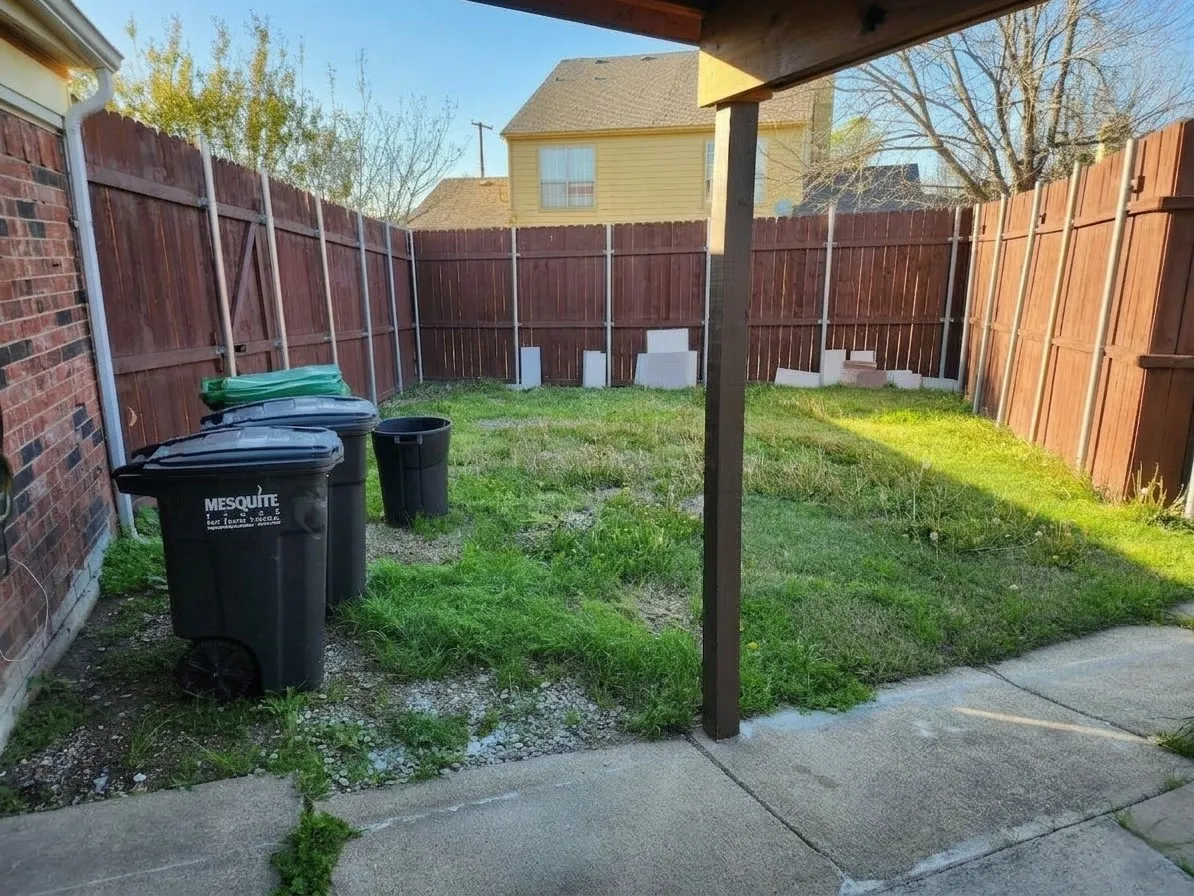 Fenced backyard featuring a patio