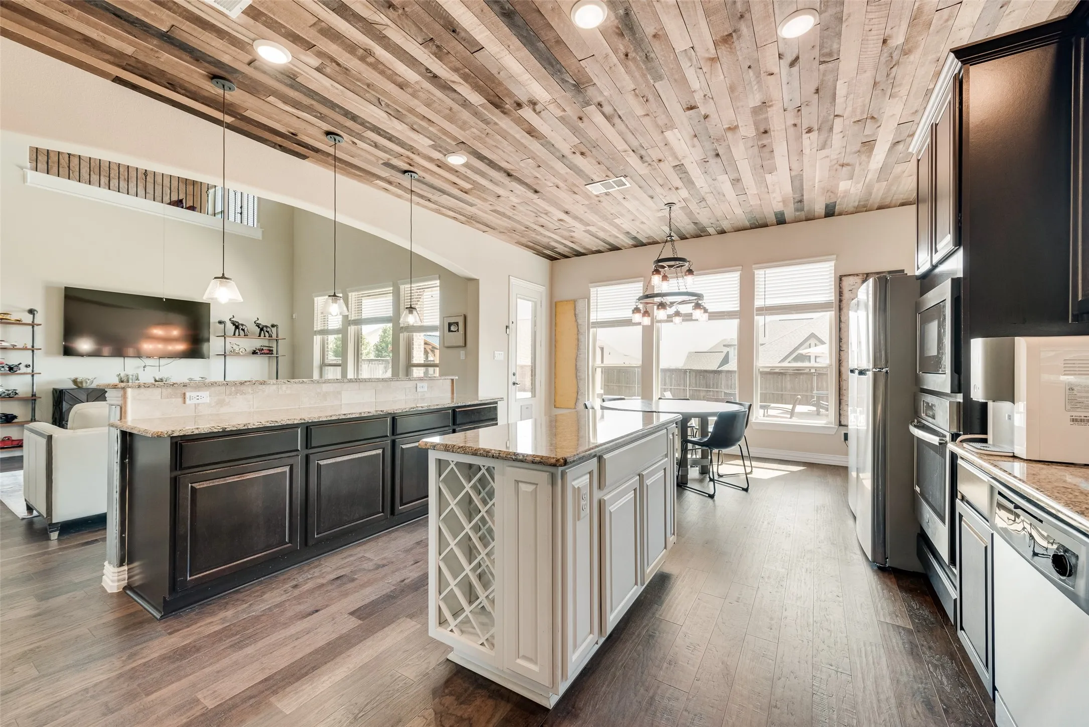 custom designed ceiling, sunny breakfast overlooking backyard