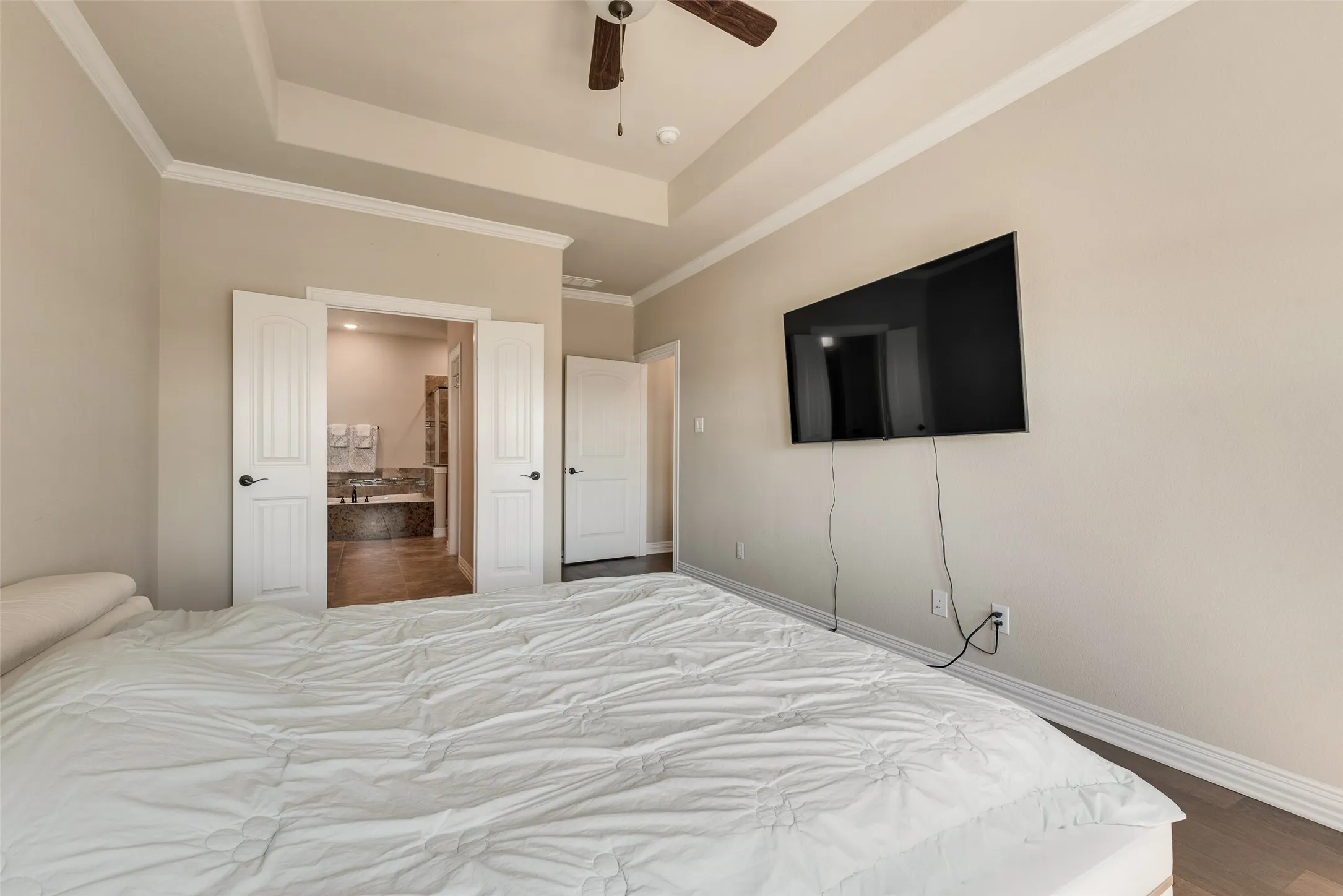 Upstairs primary bedroom with ensuite bathroom