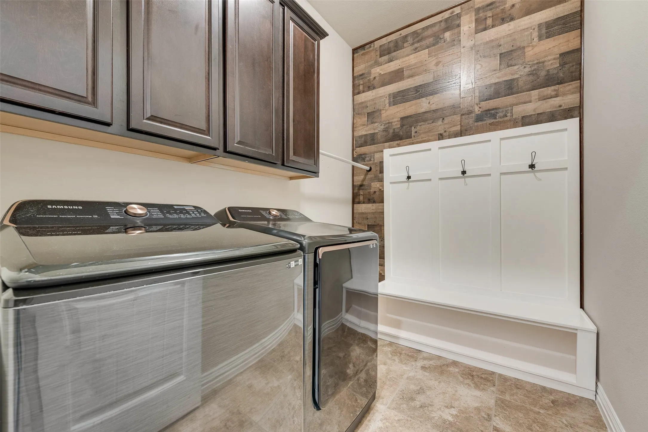 Utility room with cabinet, mud bench, room for freezer
