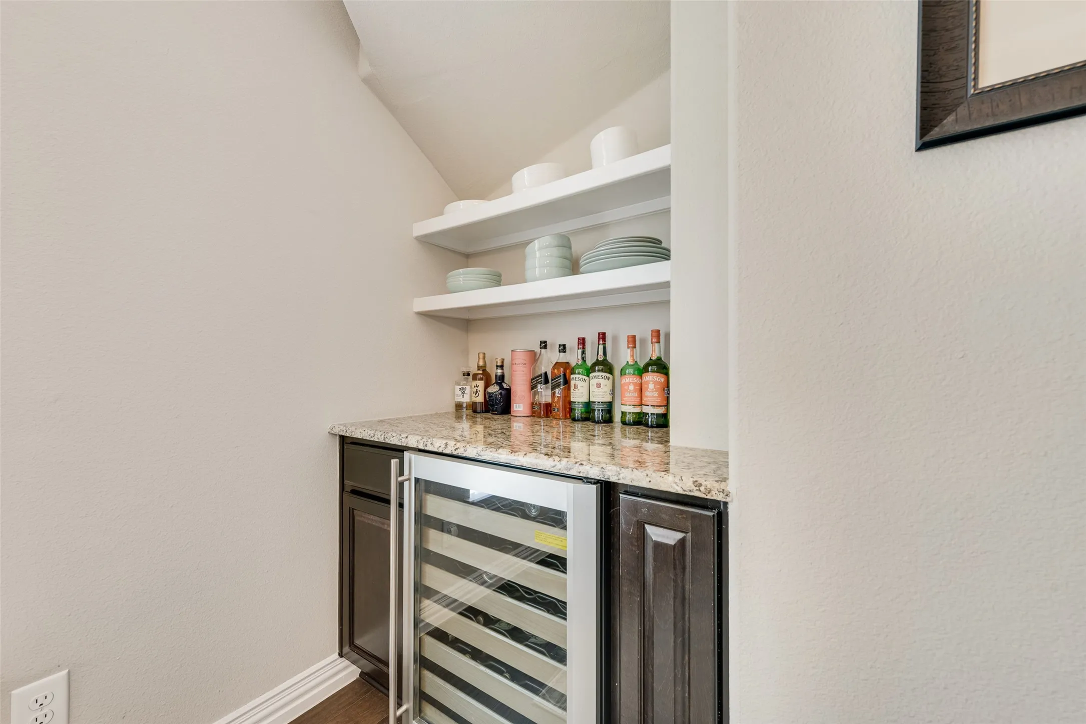 formal dining room with wine refrigerator