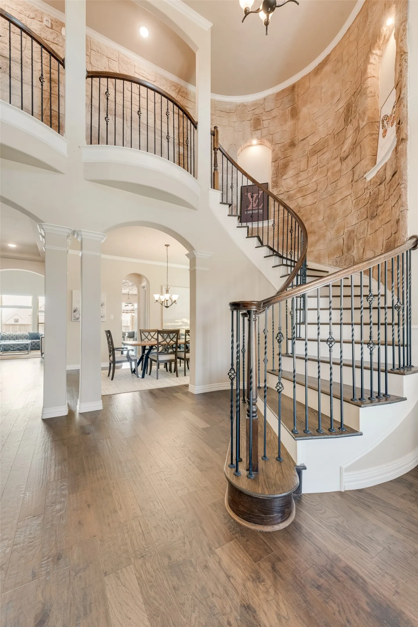 Elegant stair case with wood finish and chandler