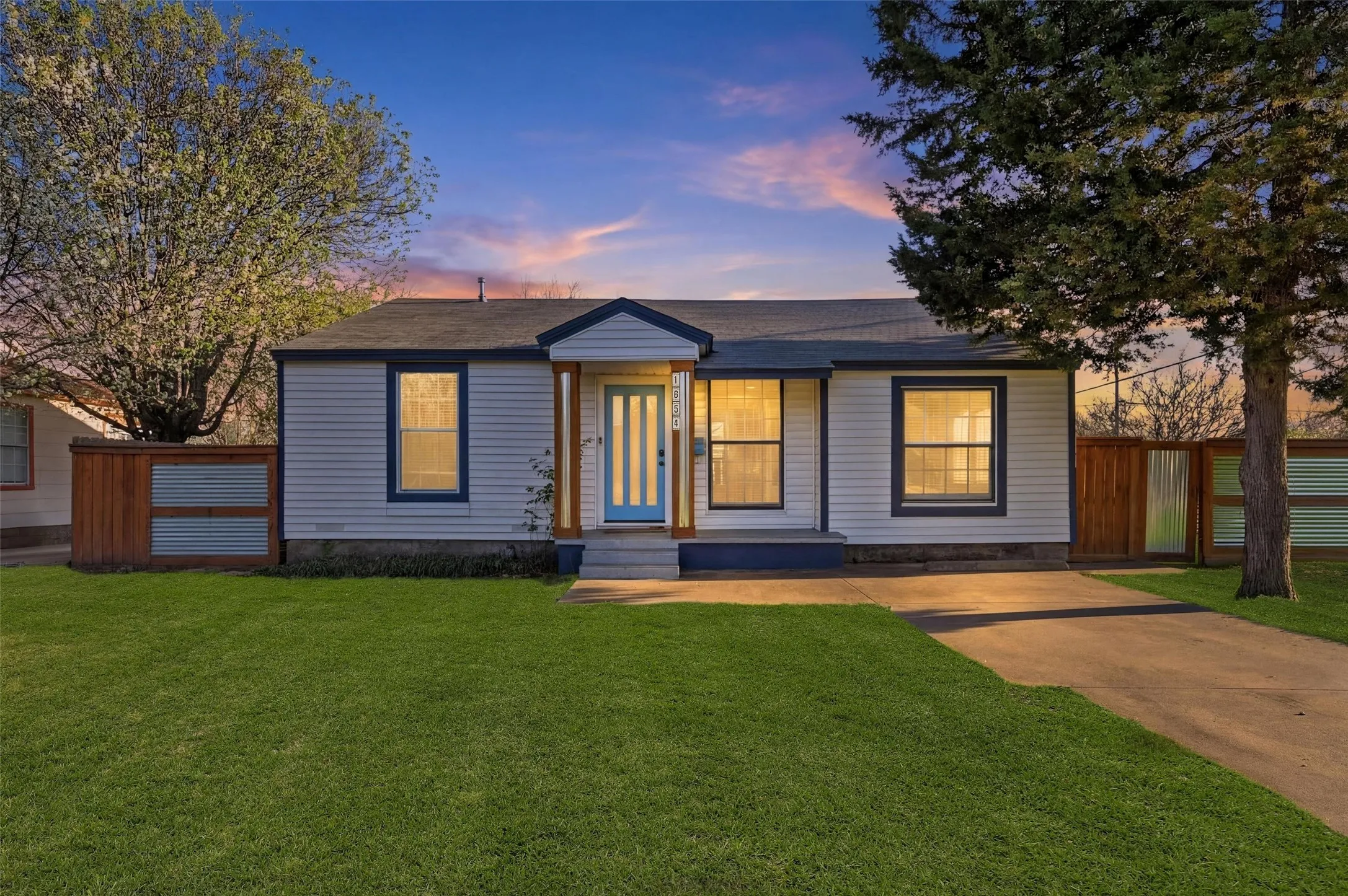 View of front of property with a front lawn