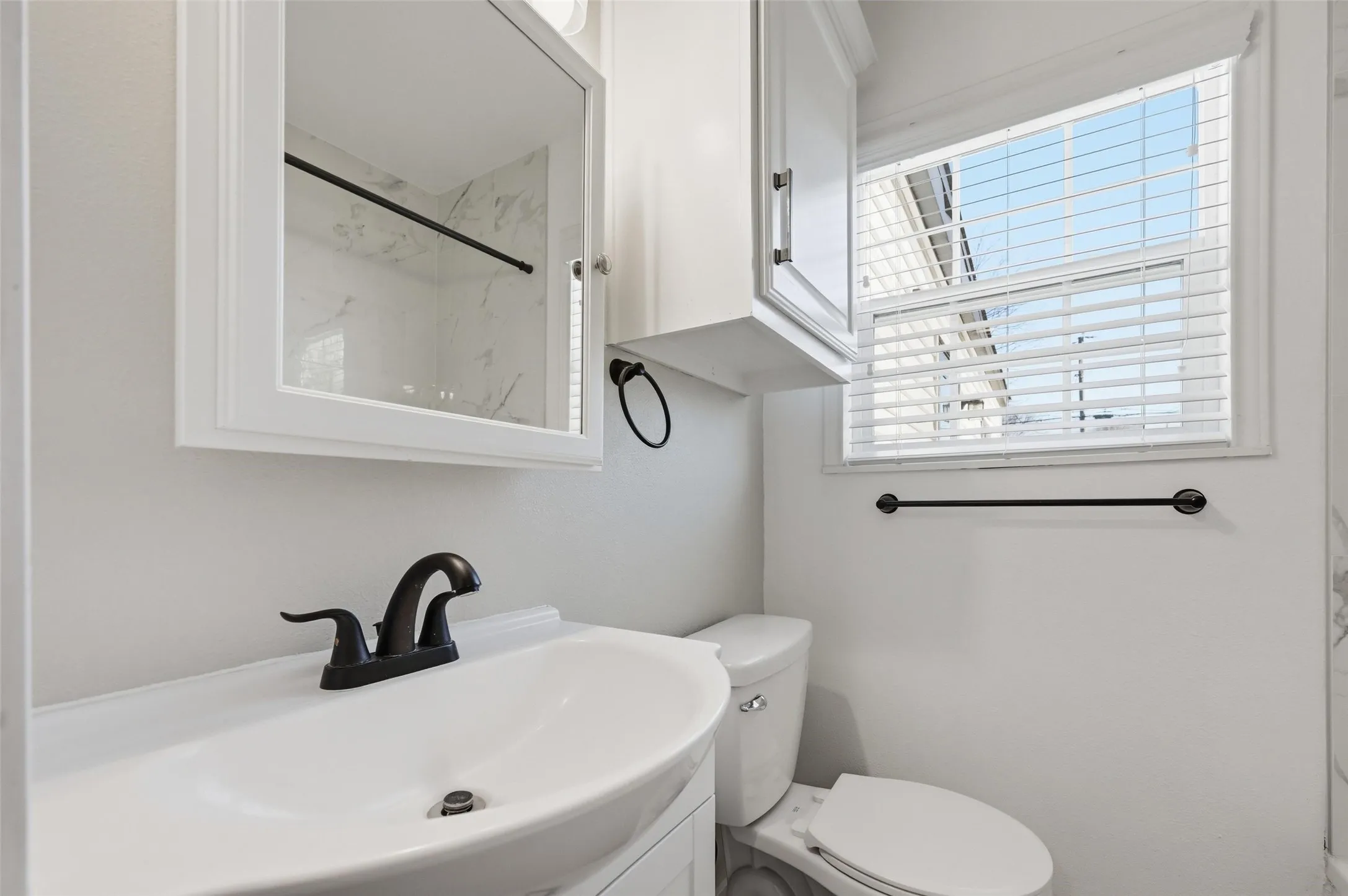 Full bathroom with a shower and vanity