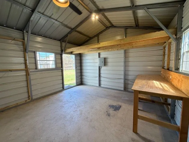 Garage featuring electric panel