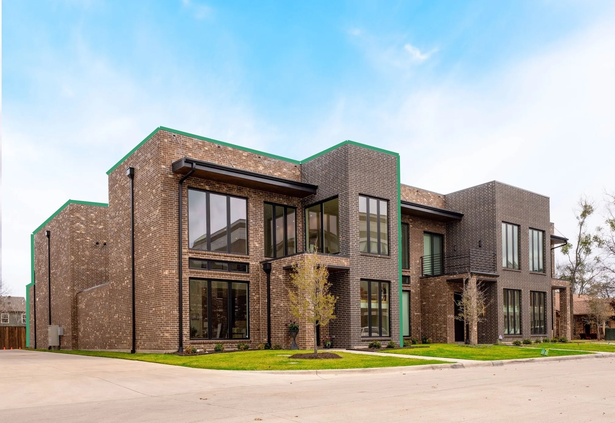 This luxury townhome is perfectly positioned as a corner unit with rear entry access.