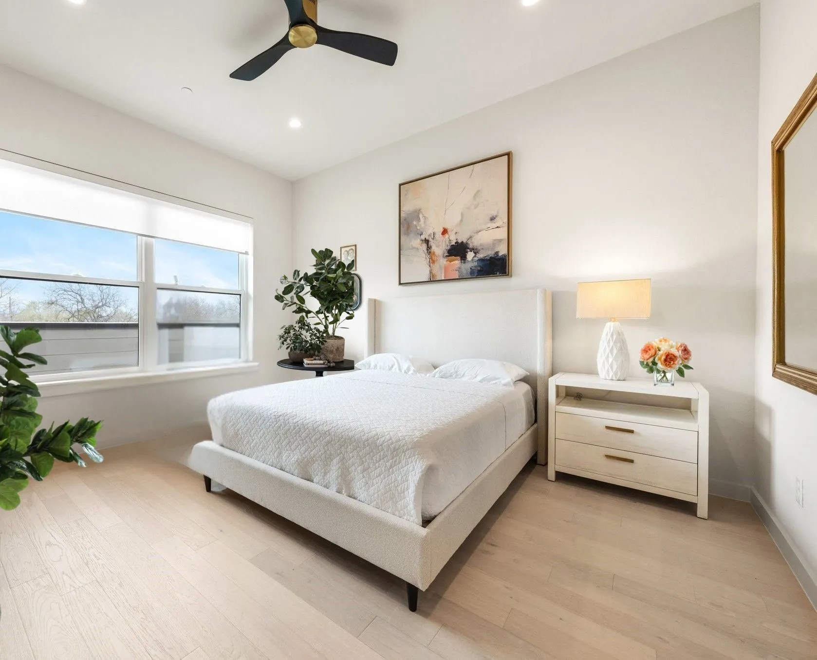 Bedroom featuring light wood-style floors, ceiling fan, and recessed lighting