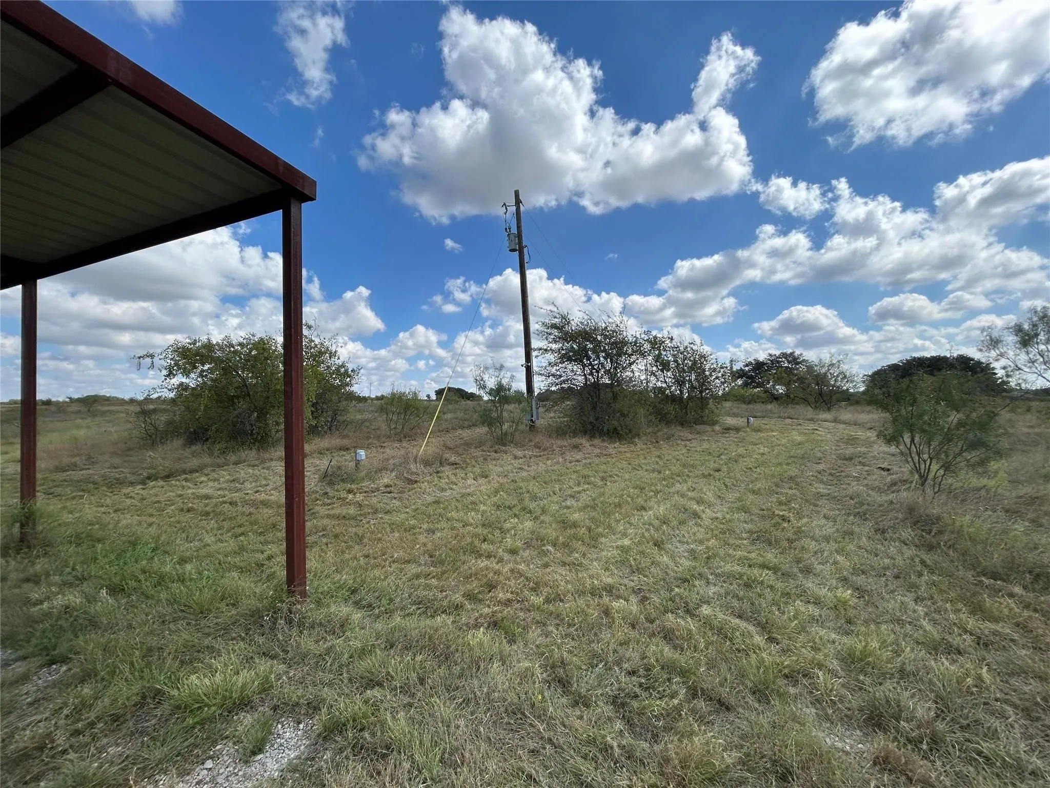 View of yard with a view of countryside