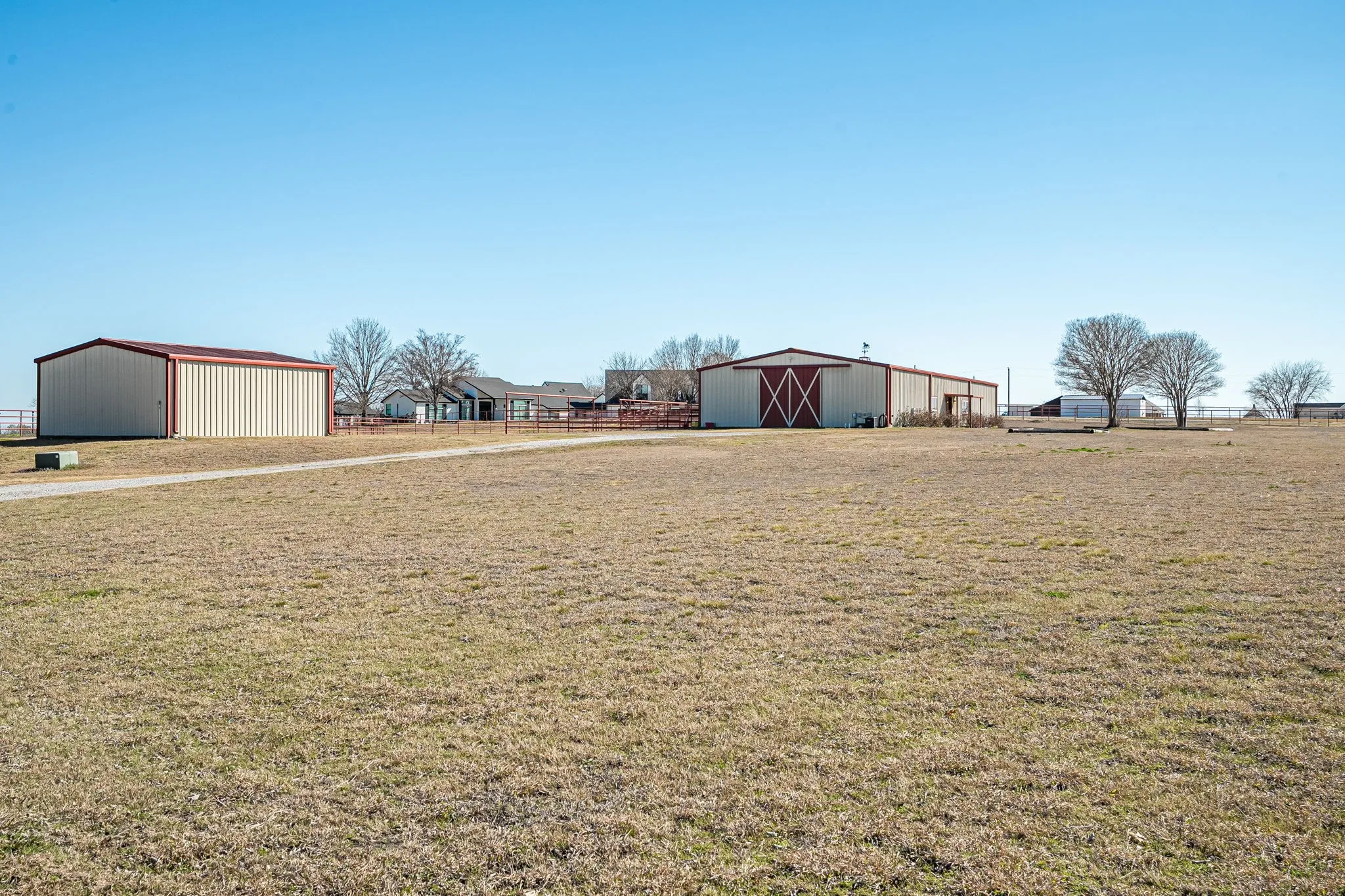 View of yard featuring an outbuilding and a pole building