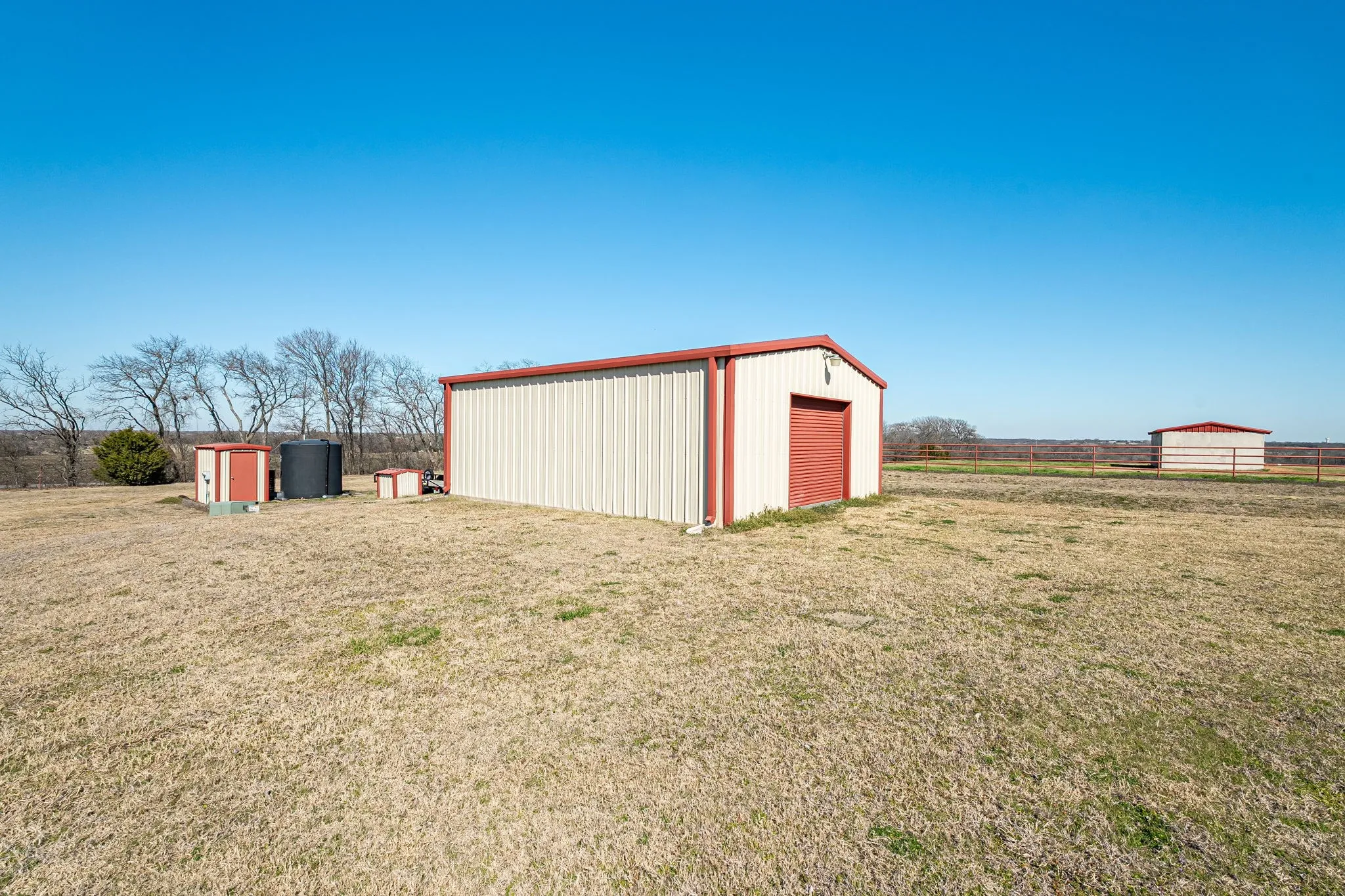 View of pole building featuring a view of countryside