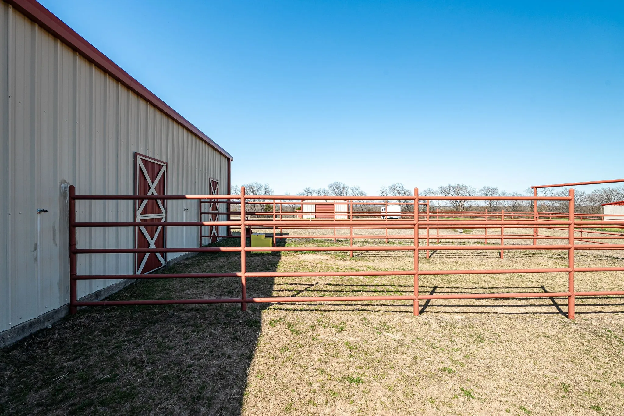 View of yard featuring an outbuilding and an exterior structure