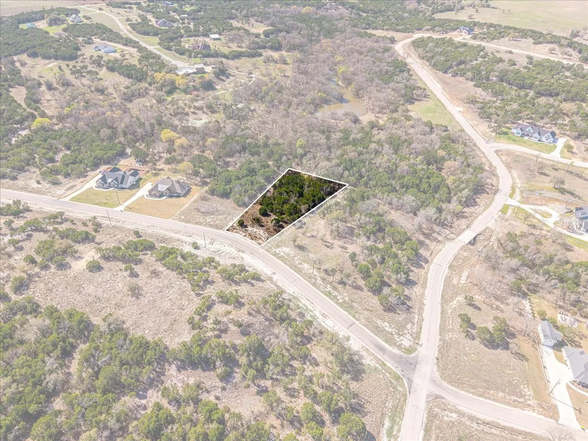 Overview of rural landscape with property parcel outlined