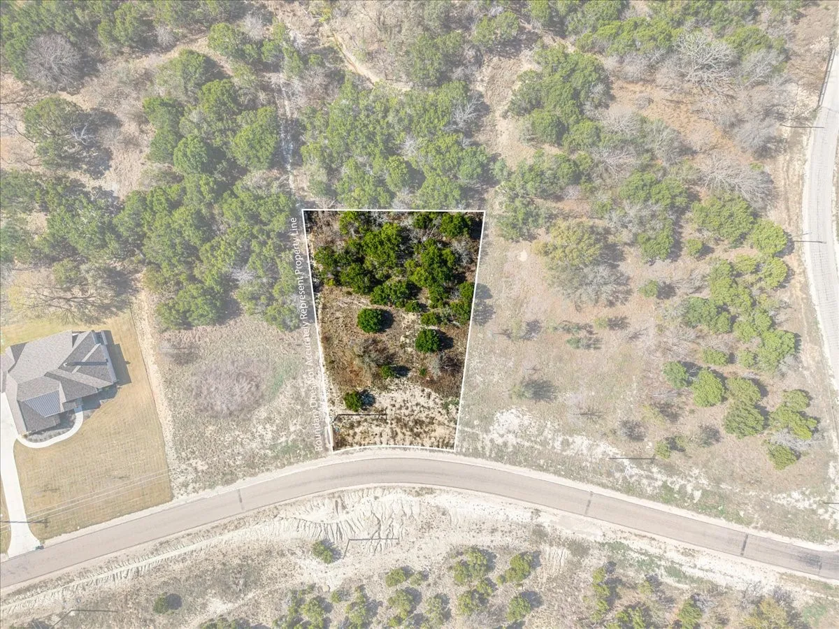 Aerial overview of property's location featuring property boundaries highlighted