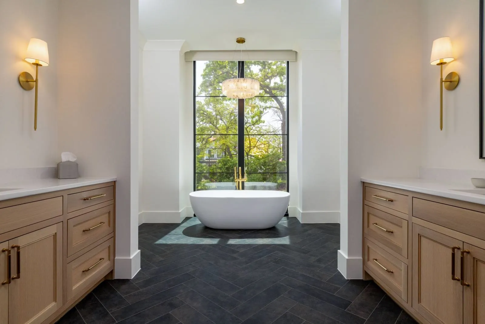 The tub is a focal point with amazing views.  Want more privacy? With the press of a button, a shade will come down to cover the window.
