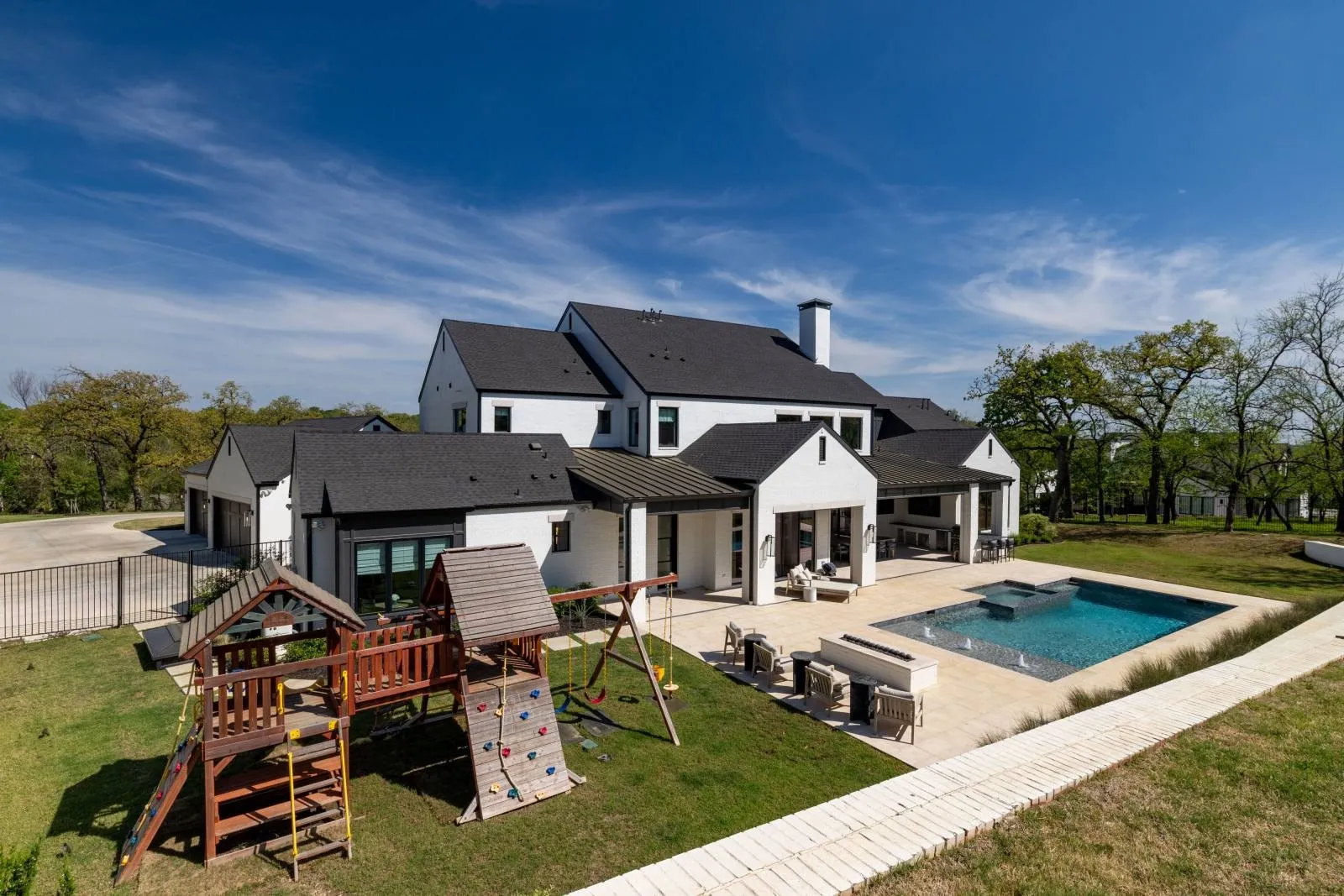 Spacious yard with play structure.