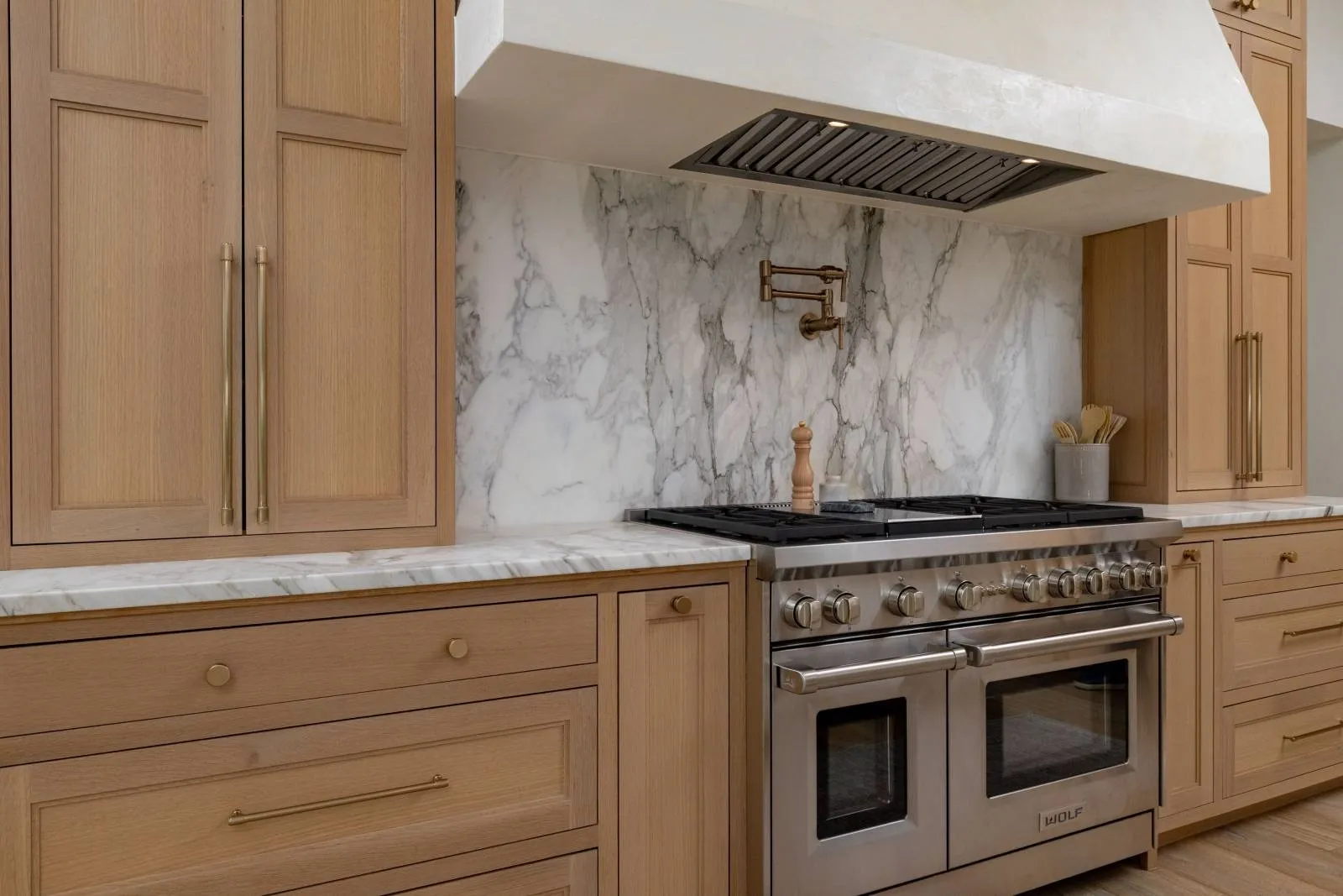 Wolf appliances finish off this stunning custom kitchen!