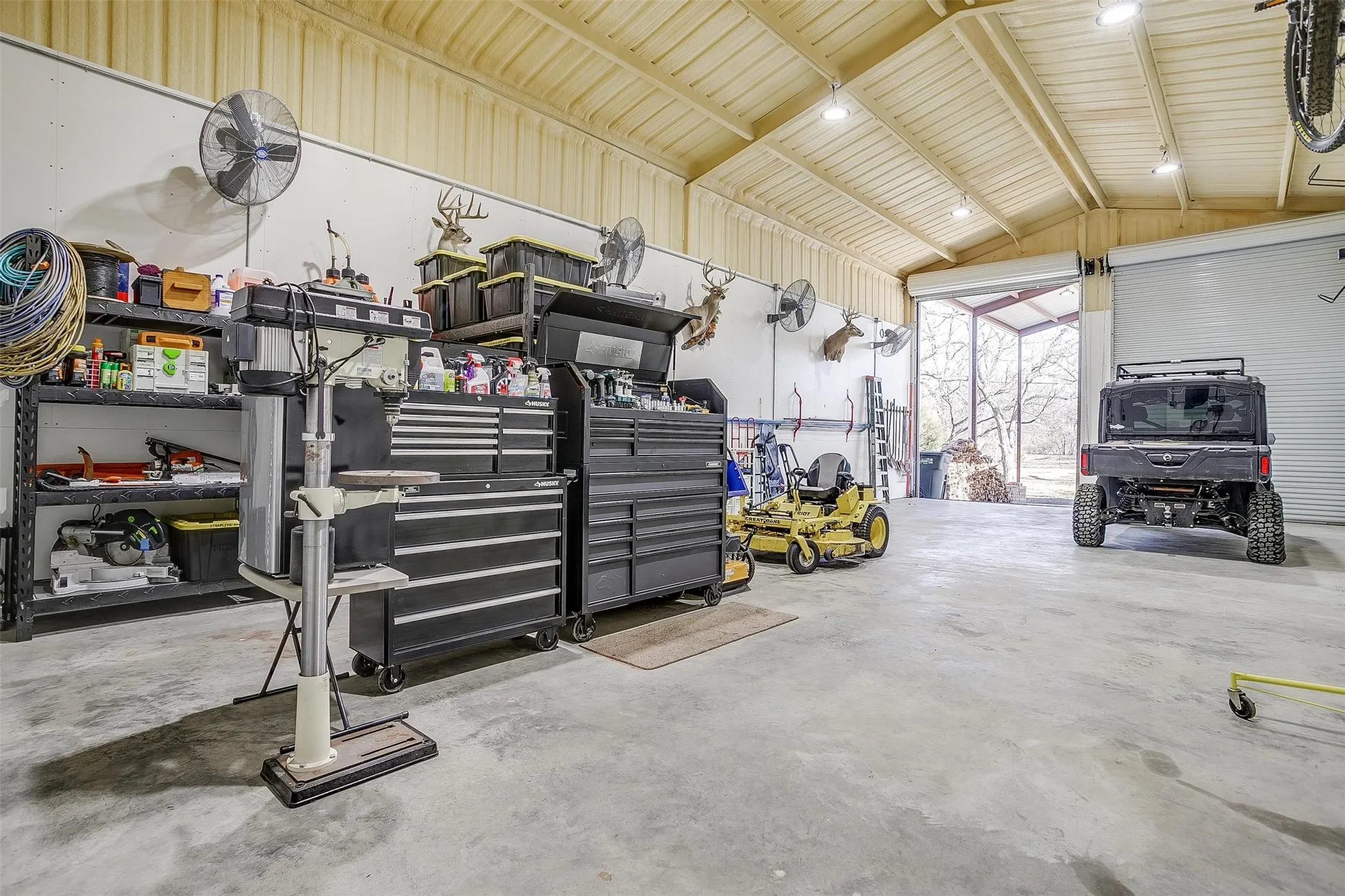 Large insulated shop plus RV/boat storage with oversized bay doors, ideal for equipment, storage, hobbies, or operational support