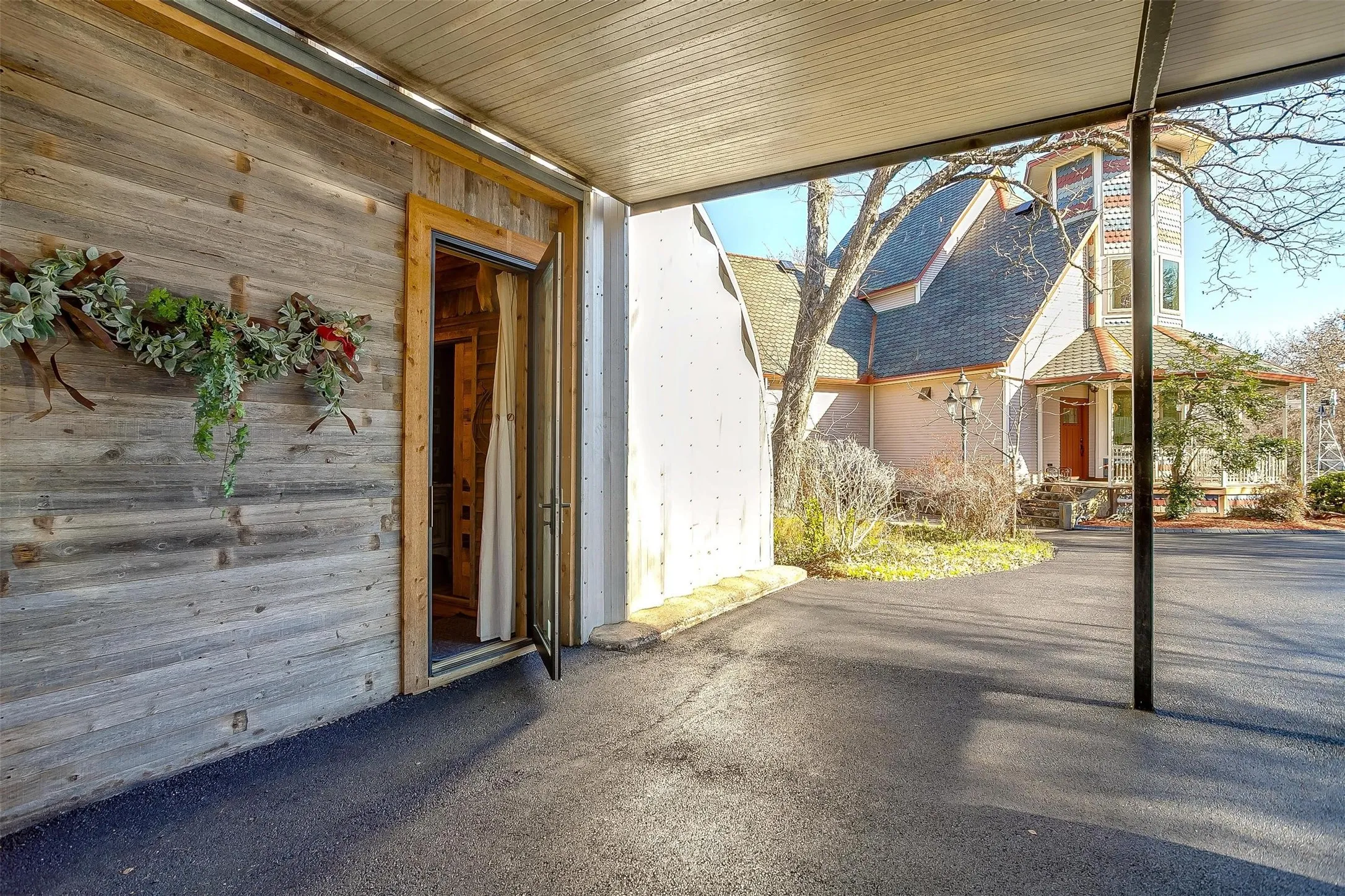 Entrance to guest quarters featuring a patio
