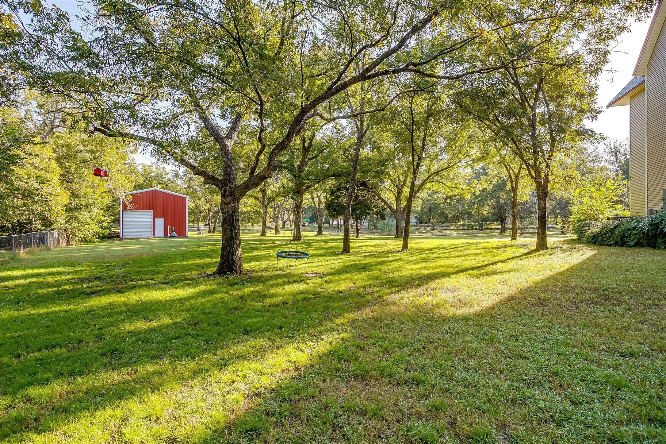 View of green lawn featuring RV/Boat Storage.