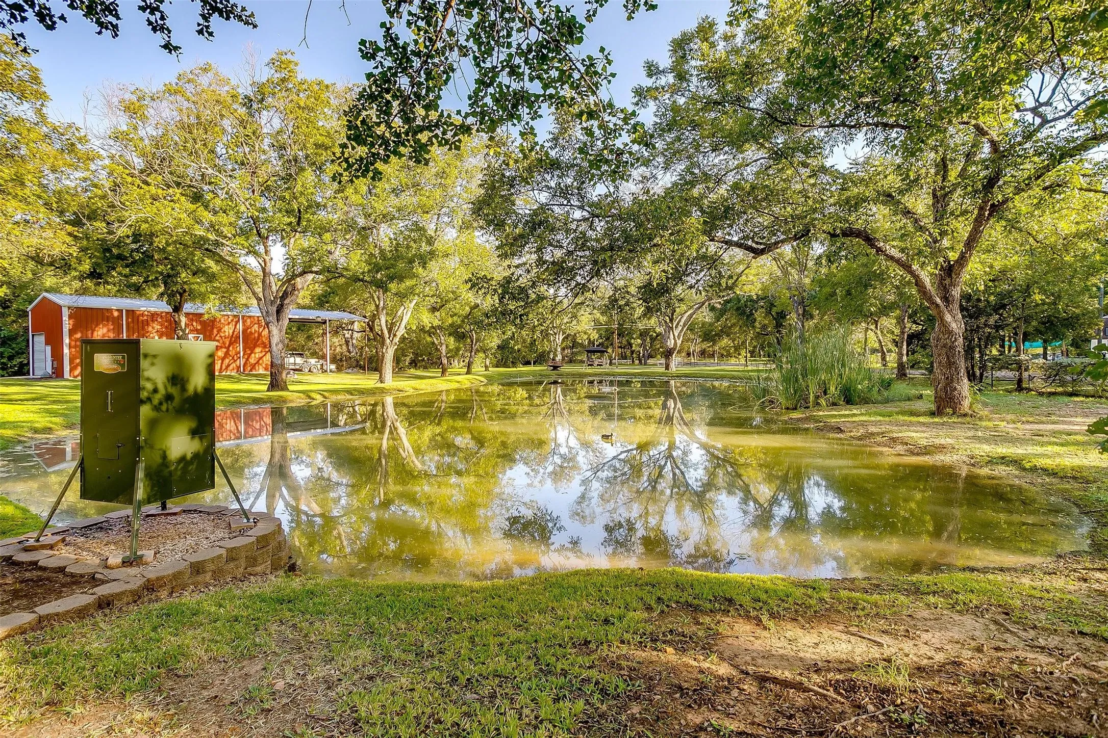 Water view with feeder and pond