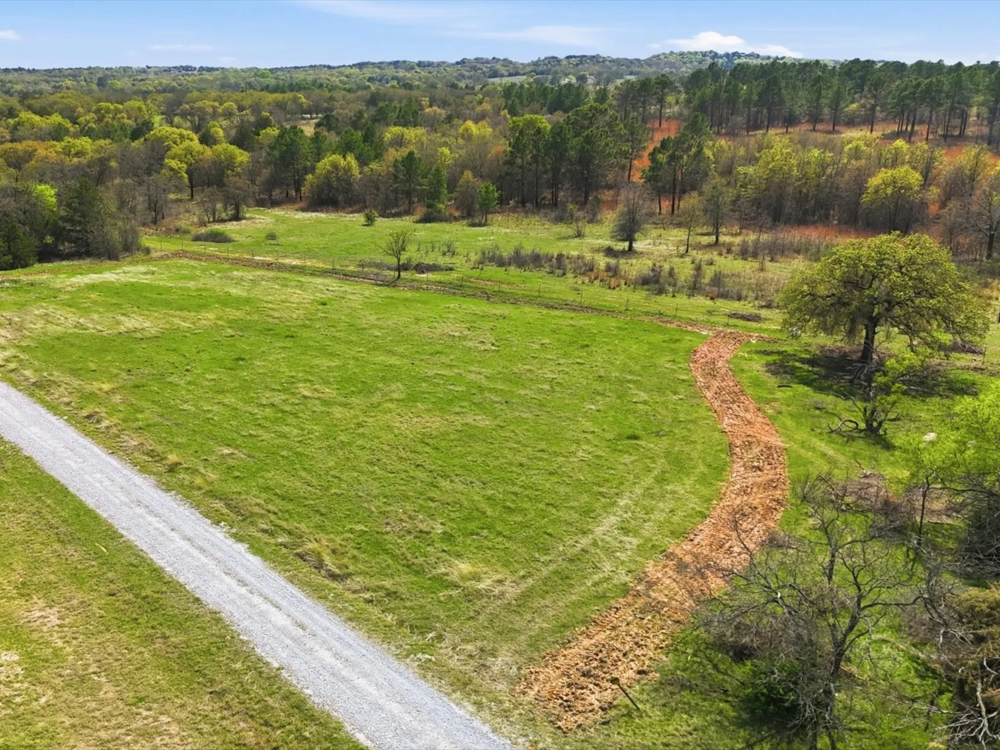 Featuring Fire Break that extends to the fence line, great fences, and the LBJ National Grasslands beyond the fence
