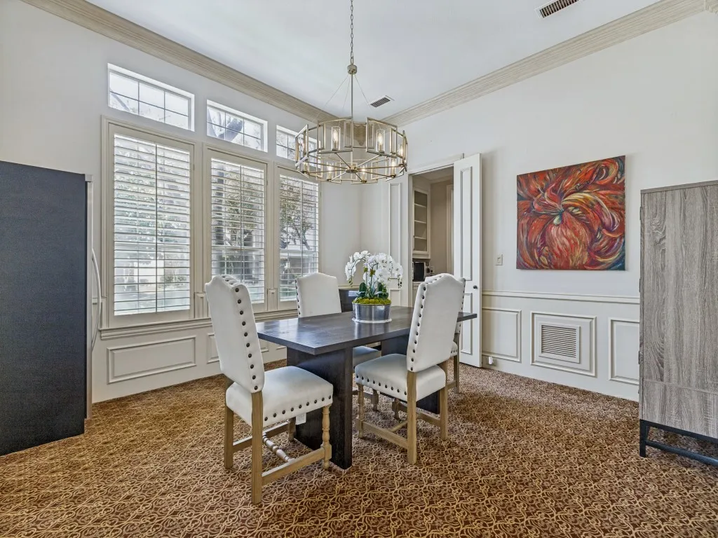 Dining room with walk through butlers pantry.