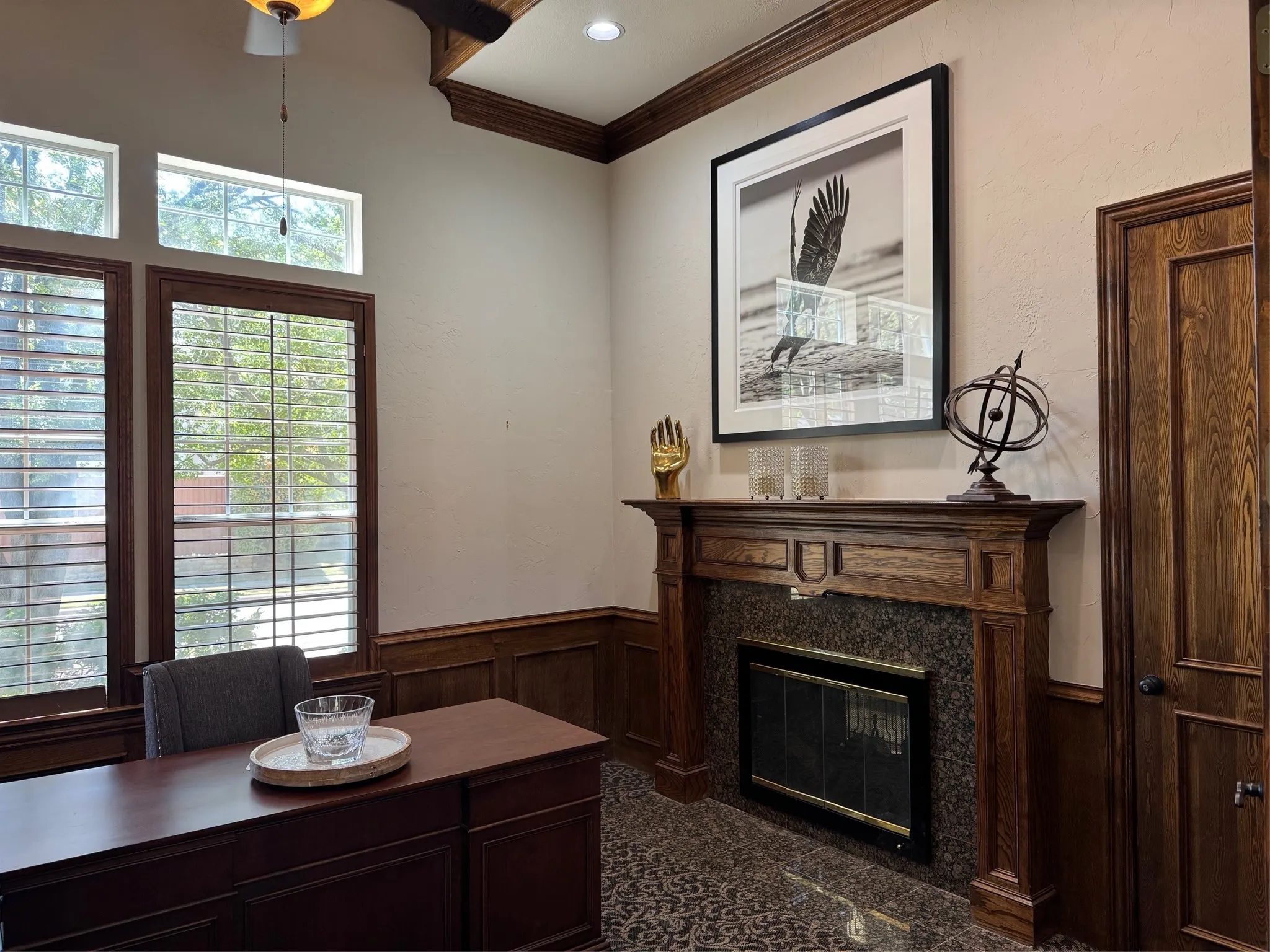 Office fire place is see through to formal living room.