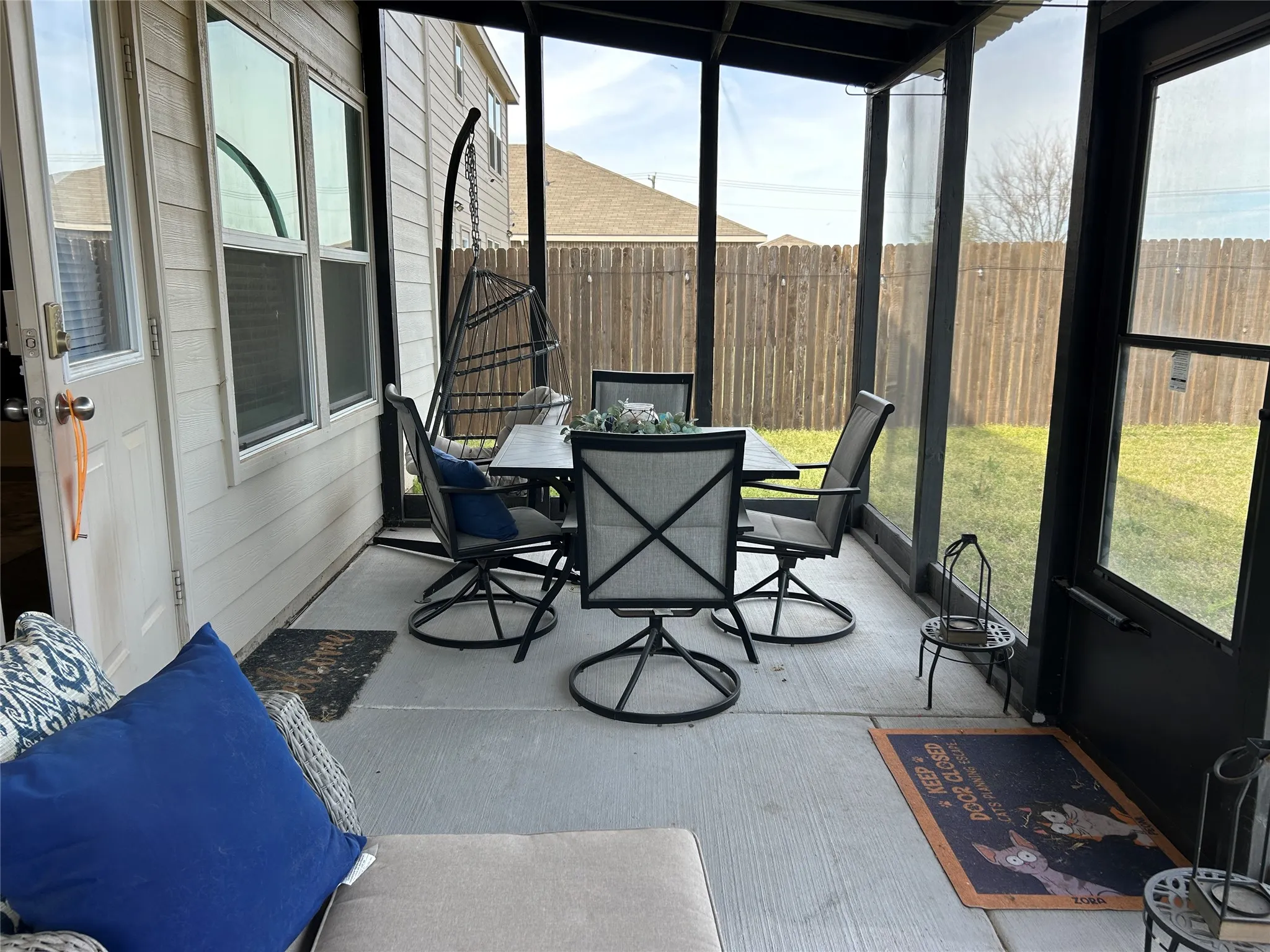 Sunroom / solarium featuring wooden walls