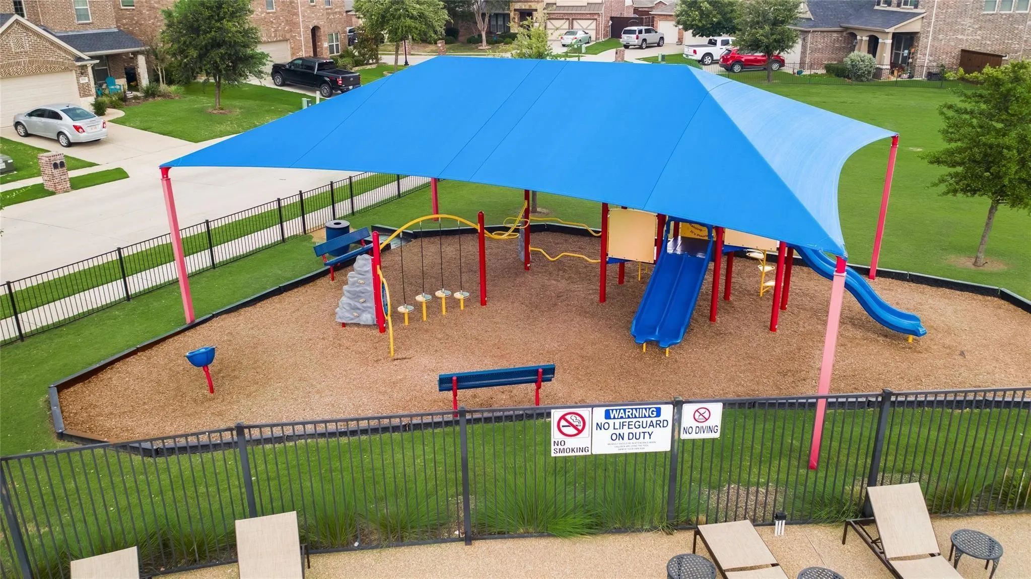 Community play area with a residential view