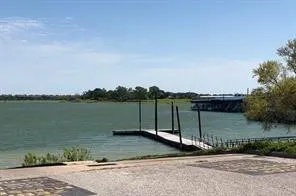 Dock with a boat ramp and a water view