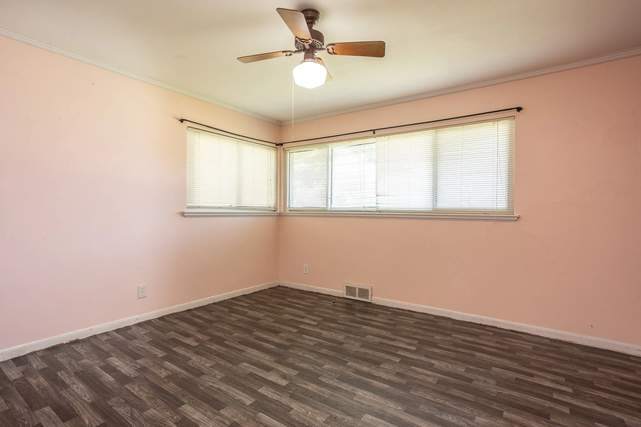 Front bedroom has high windows.