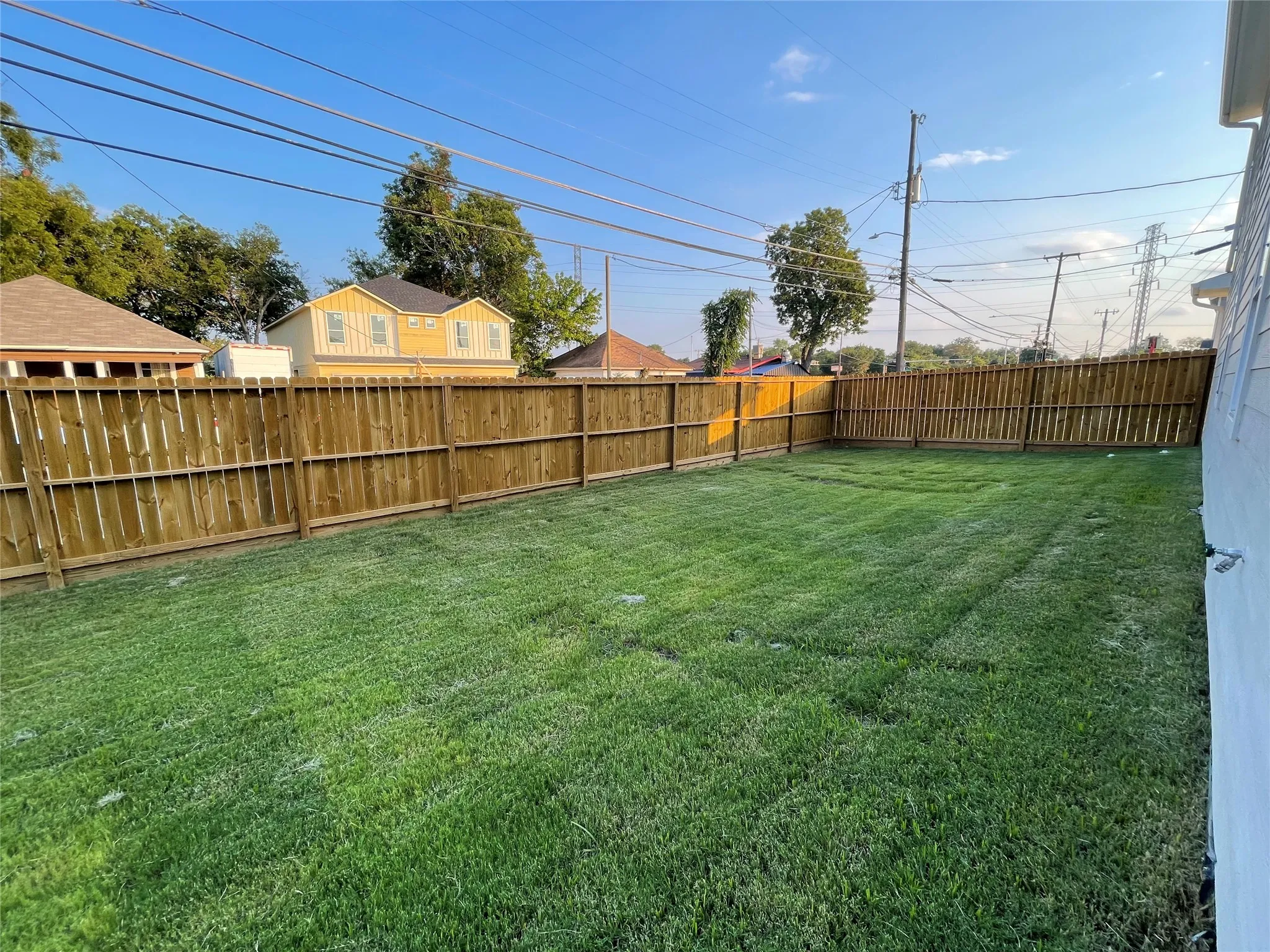 View of fenced backyard