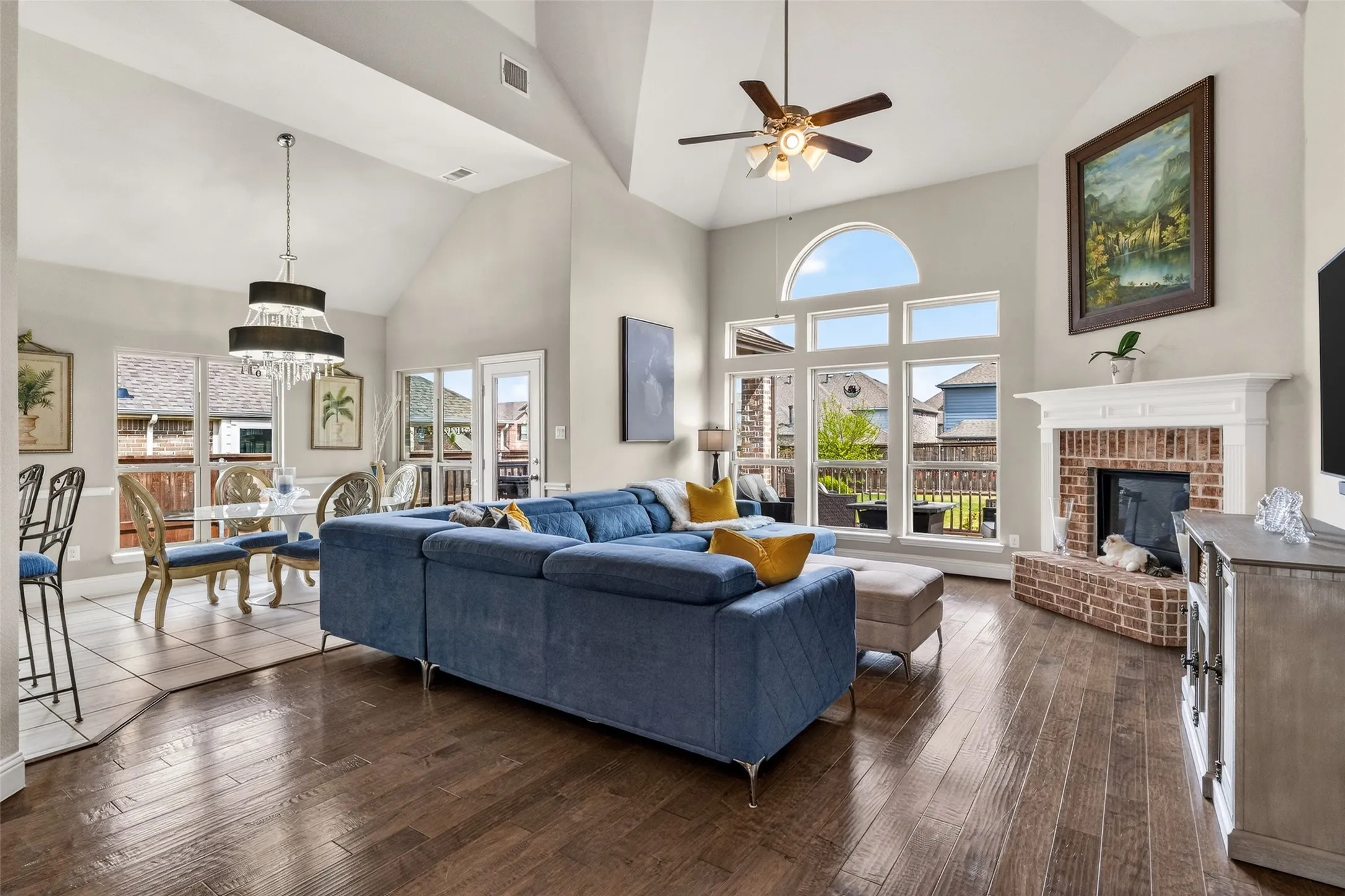 Open concept with tall ceilings and plenty of natural light