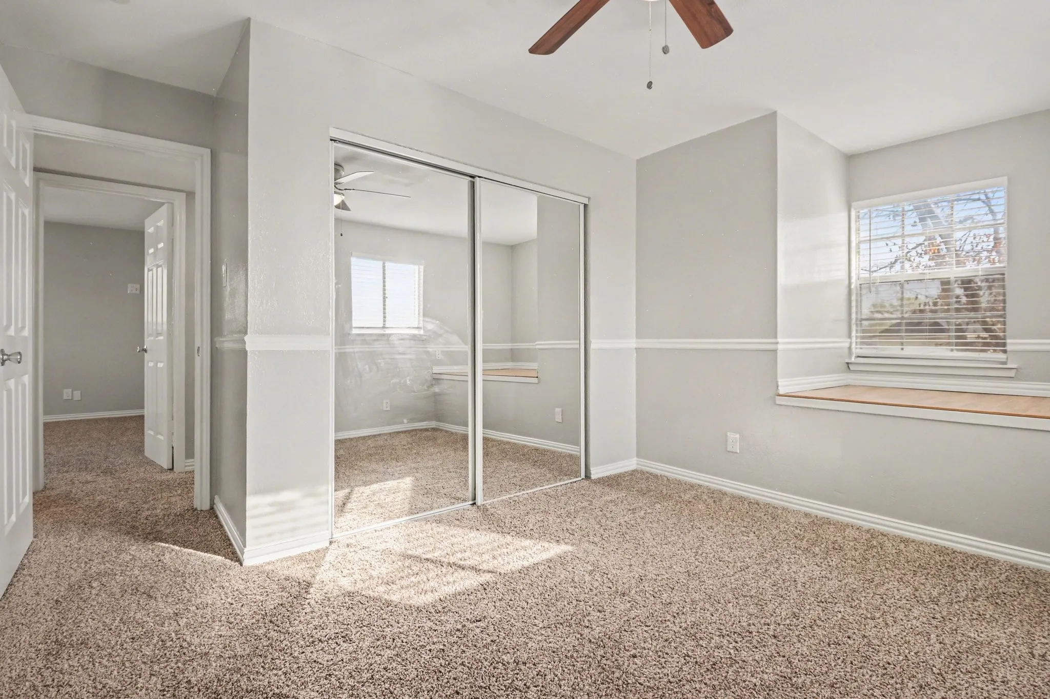 Unique bedroom that has an area possibly for a mattress or thick cussion to use as a sleeping area and save on space.
