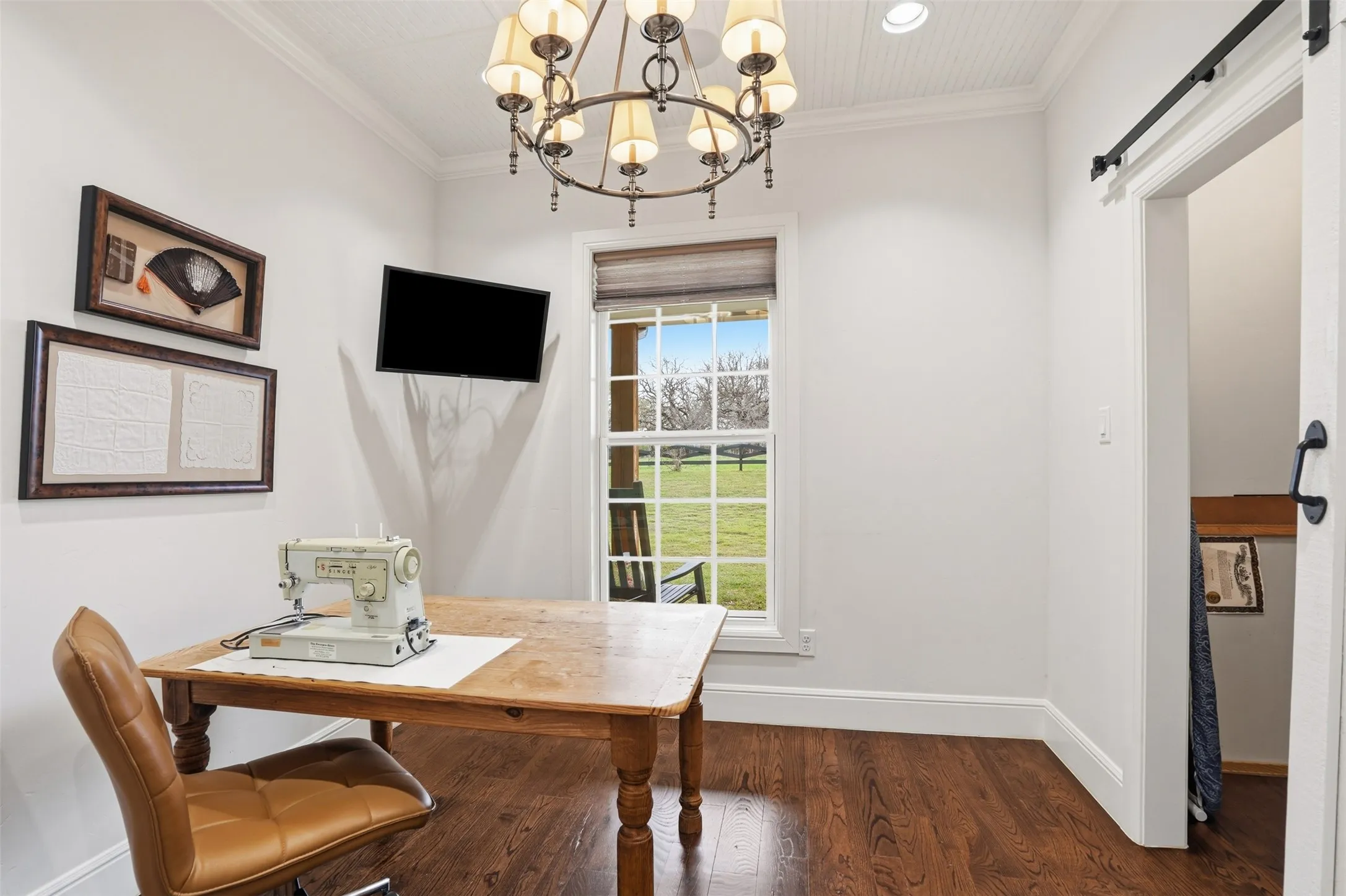 This room is tucked away behind the pantry door. Deep, walk-in closet, great for crafting!