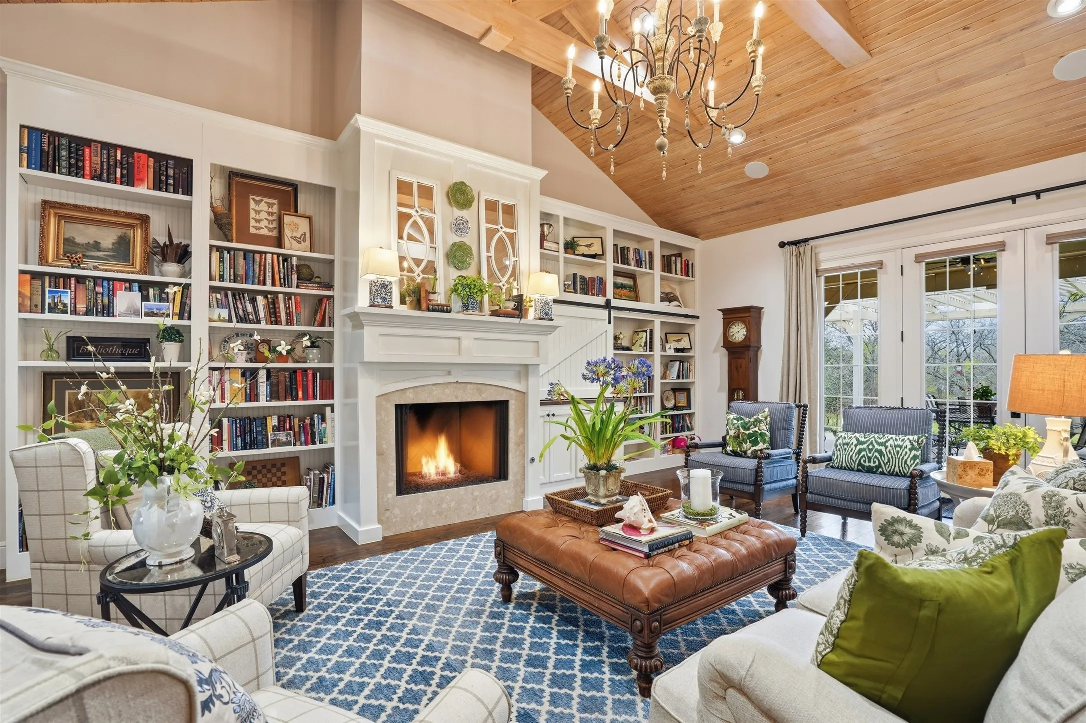 TV Hidden to the right of the fireplace behind sliding door.